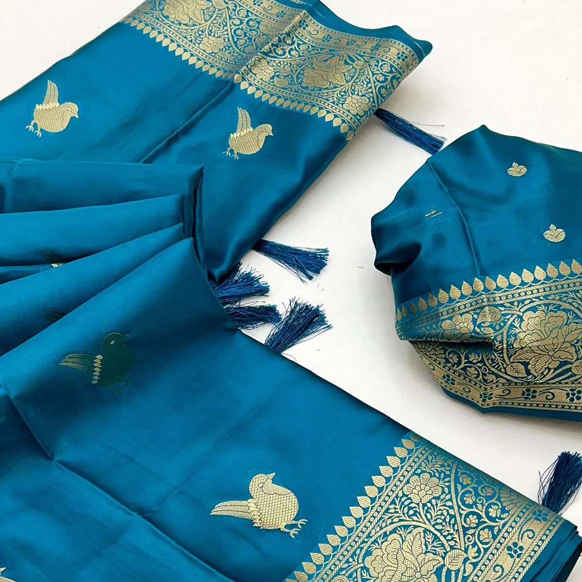 Blue Satin Silk Saree With Zari Woven Bird Motifs & Elegant Tassel Border
