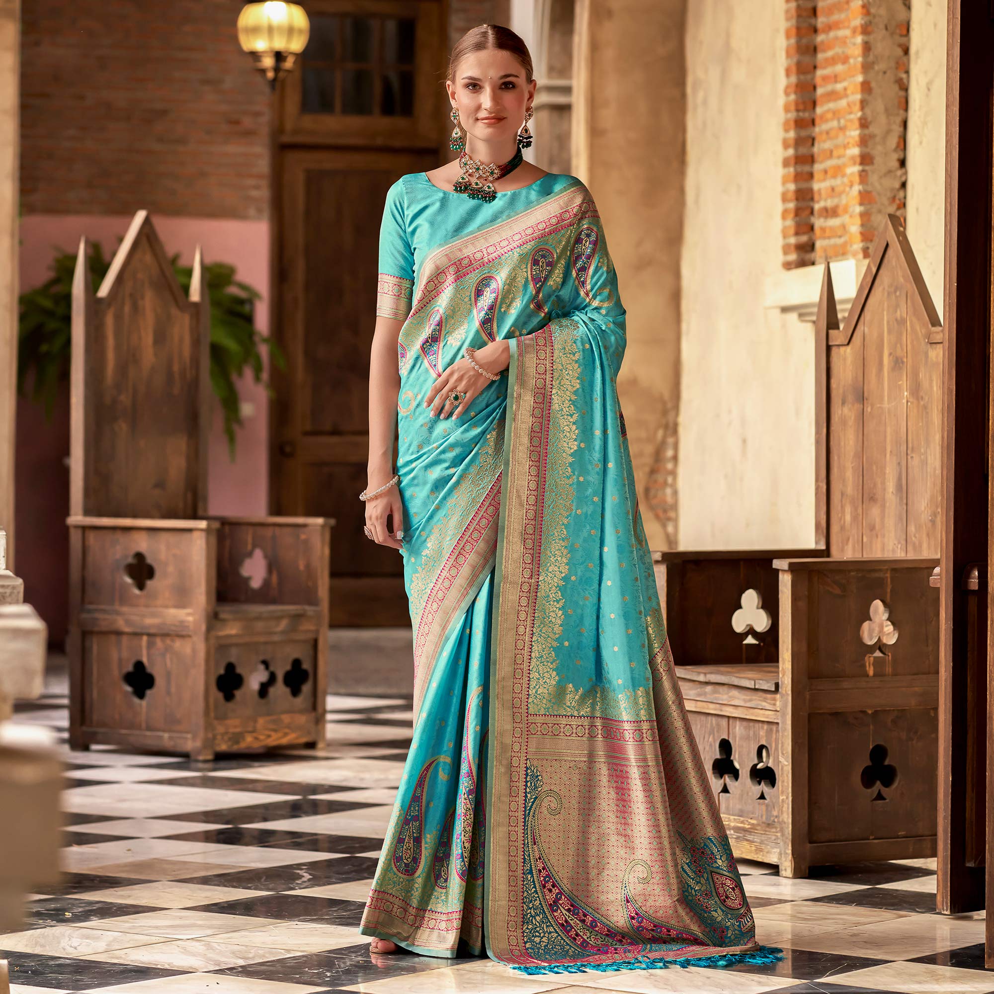 Turquoise Floral Woven Banarasi Silk Saree With Tassels