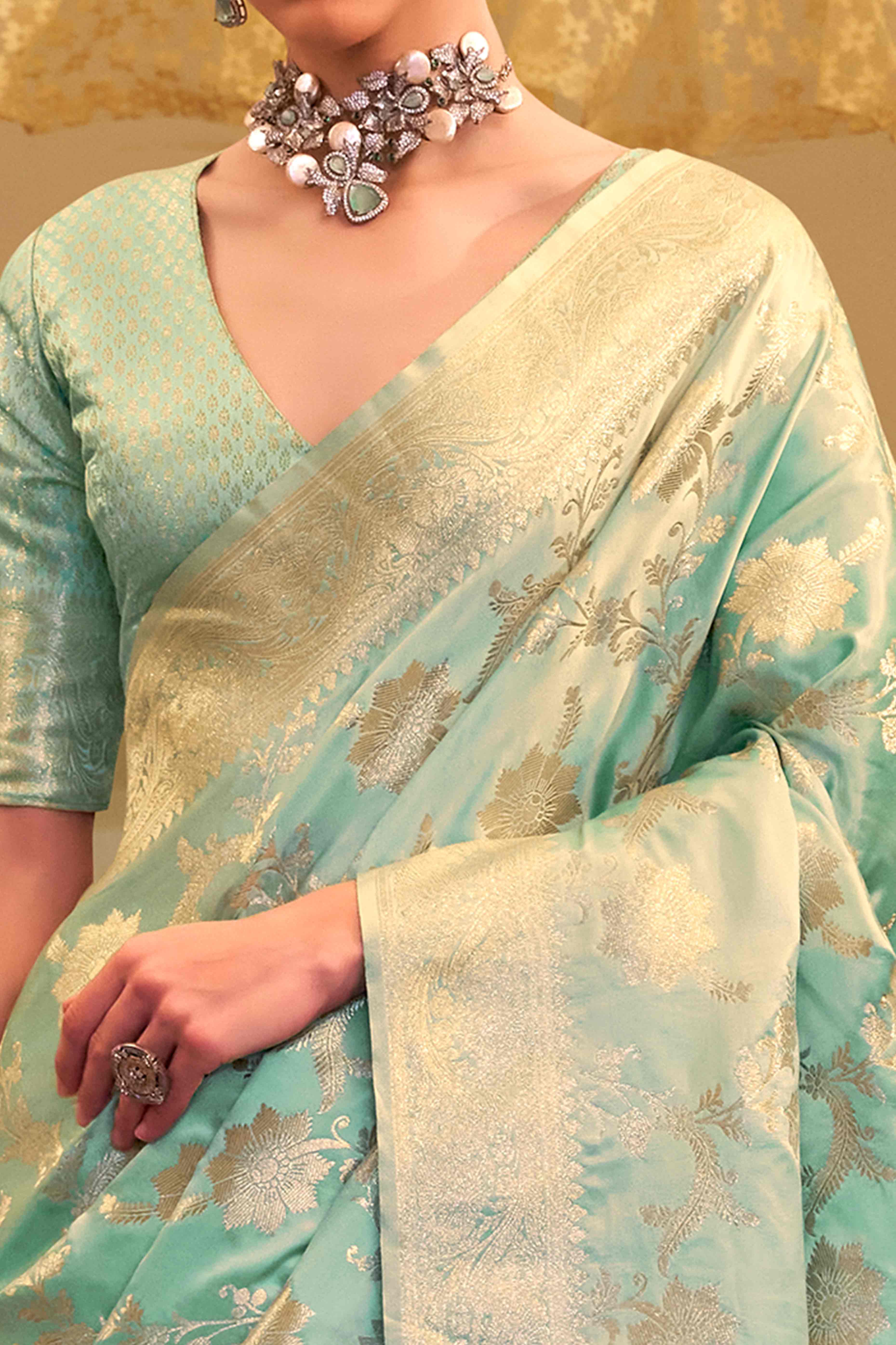 Mint Green Soft Satin Saree Featuring Exquisite Zari Weaving Work