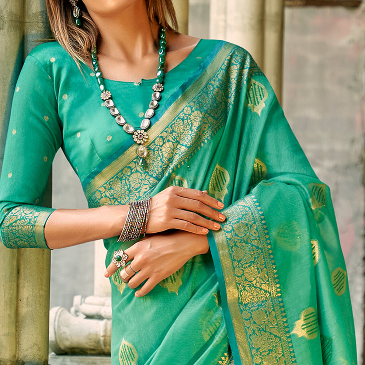 Rama Green Floral Woven Tissue Silk Saree With Tassels