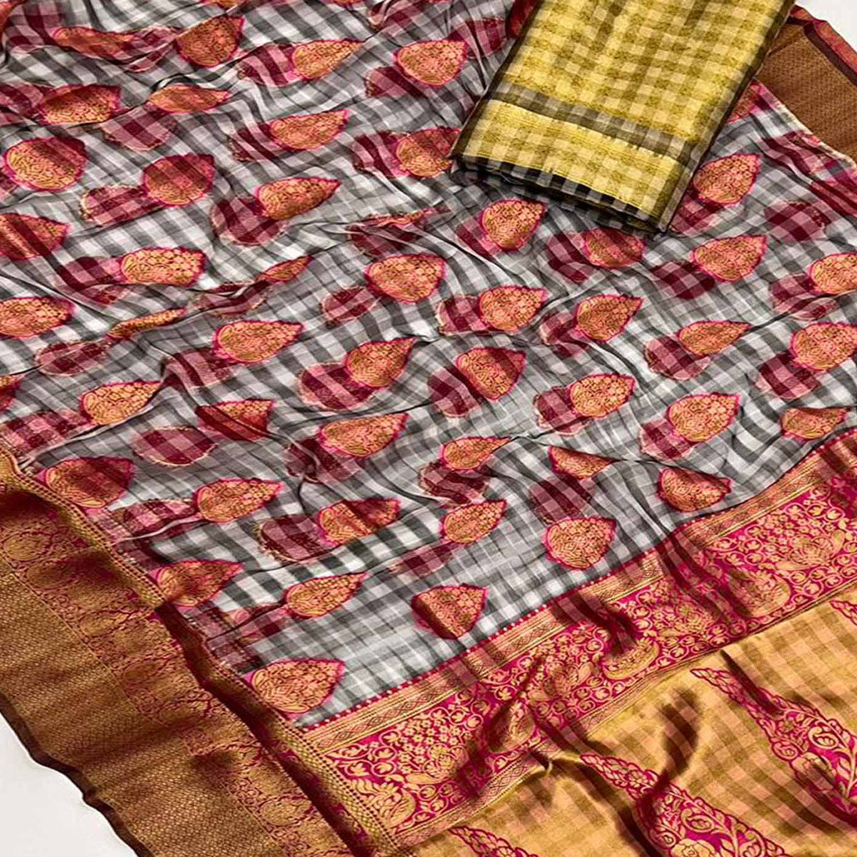 Rani Pink Checks Woven Organza Saree With Tassels
