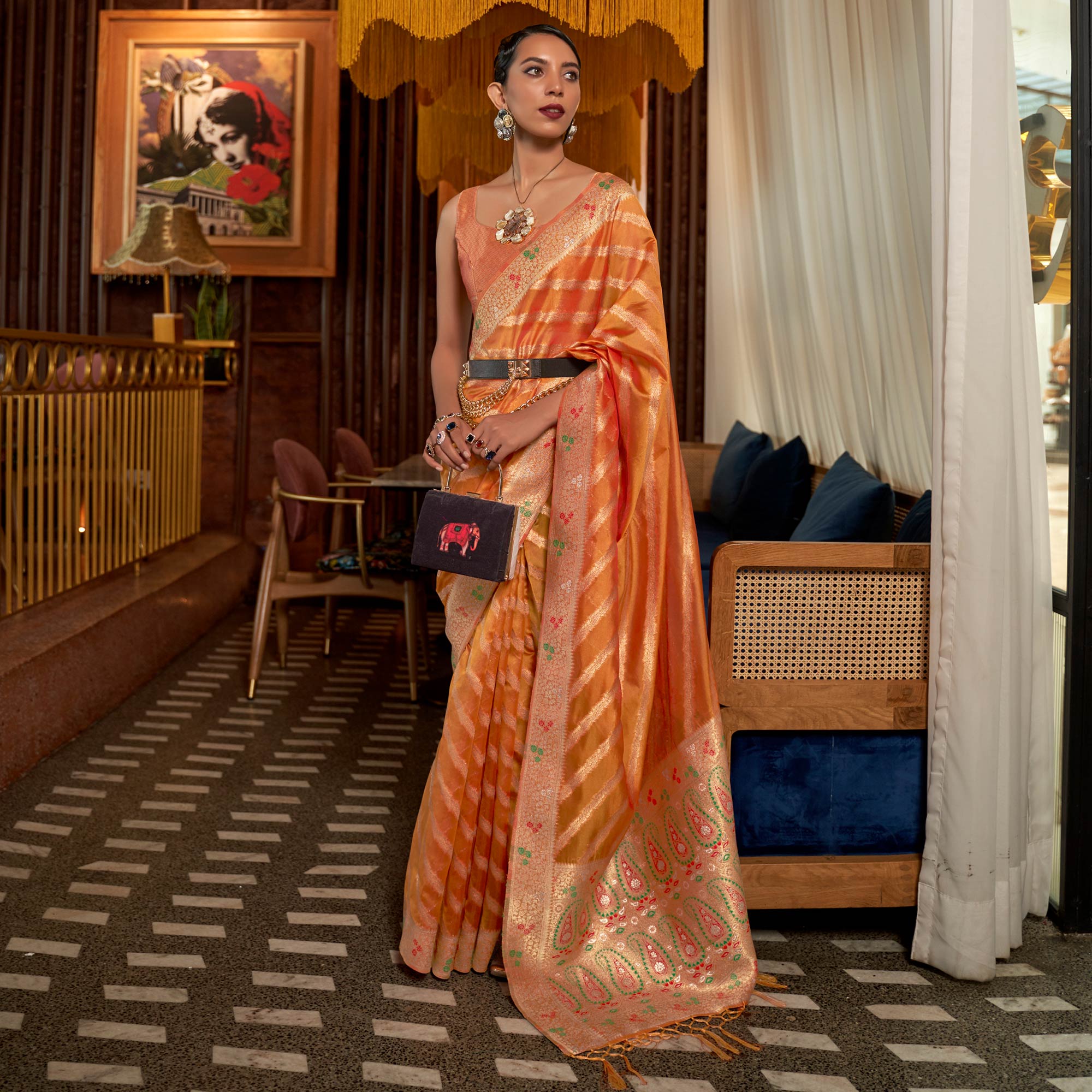 Orange Woven Organza Saree With Tassels