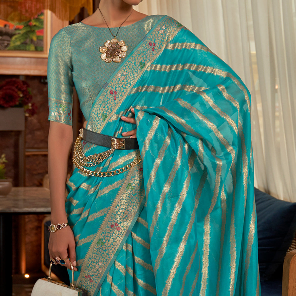 Rama Blue Woven Organza Saree With Tassels