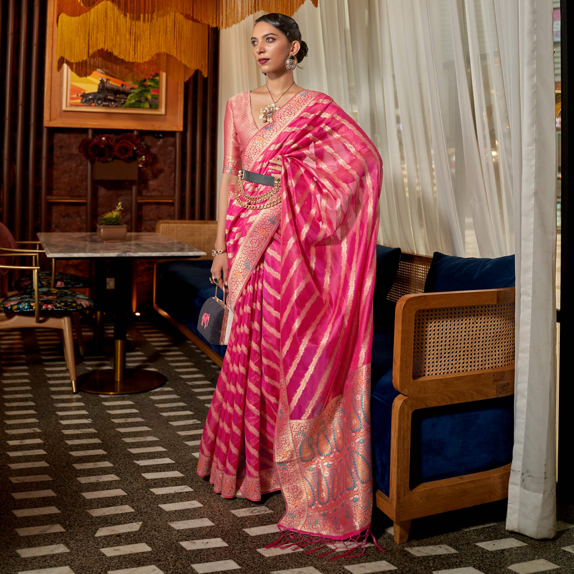 Pink Woven Organza Saree With Tassels