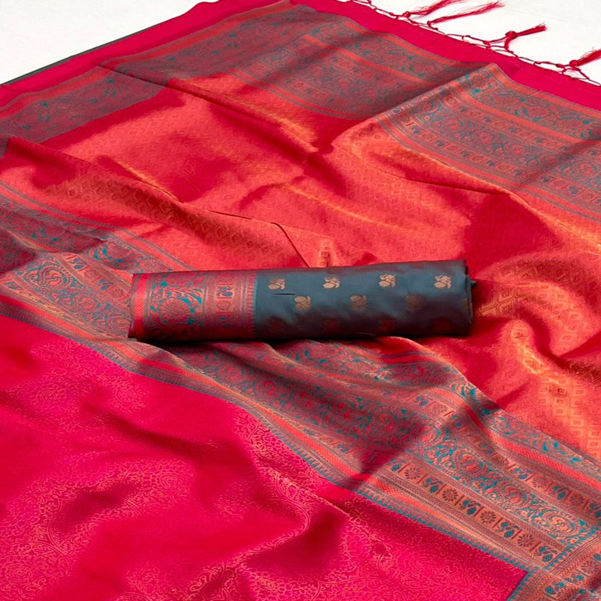 Rani Pink Floral Woven Art Silk Saree With Tassels