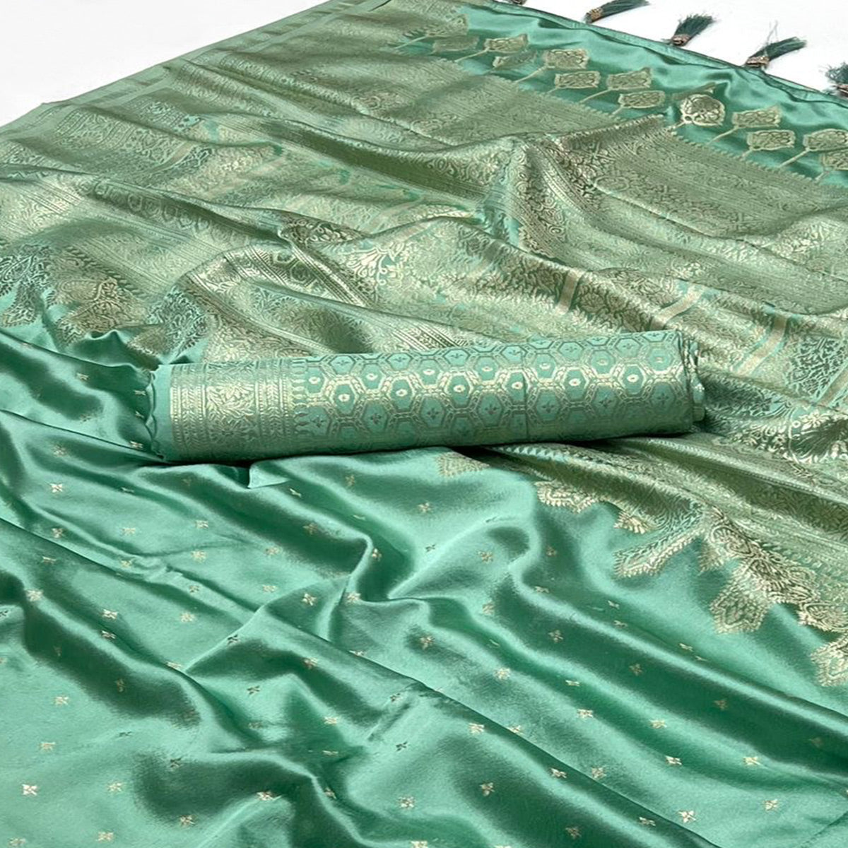 Sea Green Zari Woven Satin Saree With Tassels