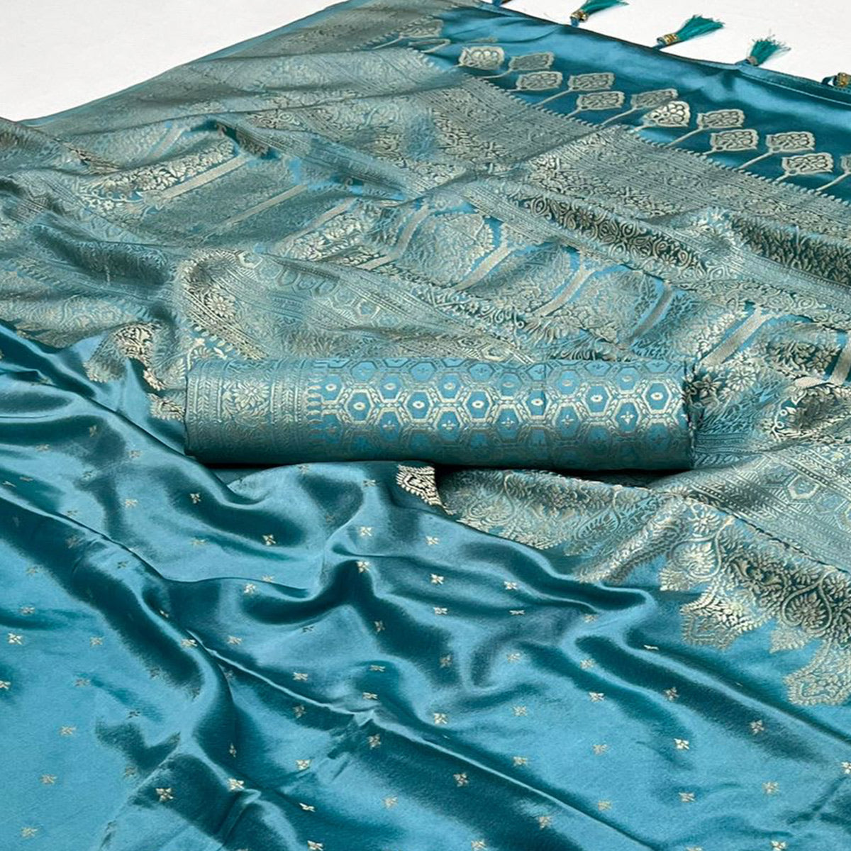 Rama Blue Zari Woven Satin Saree With Tassels