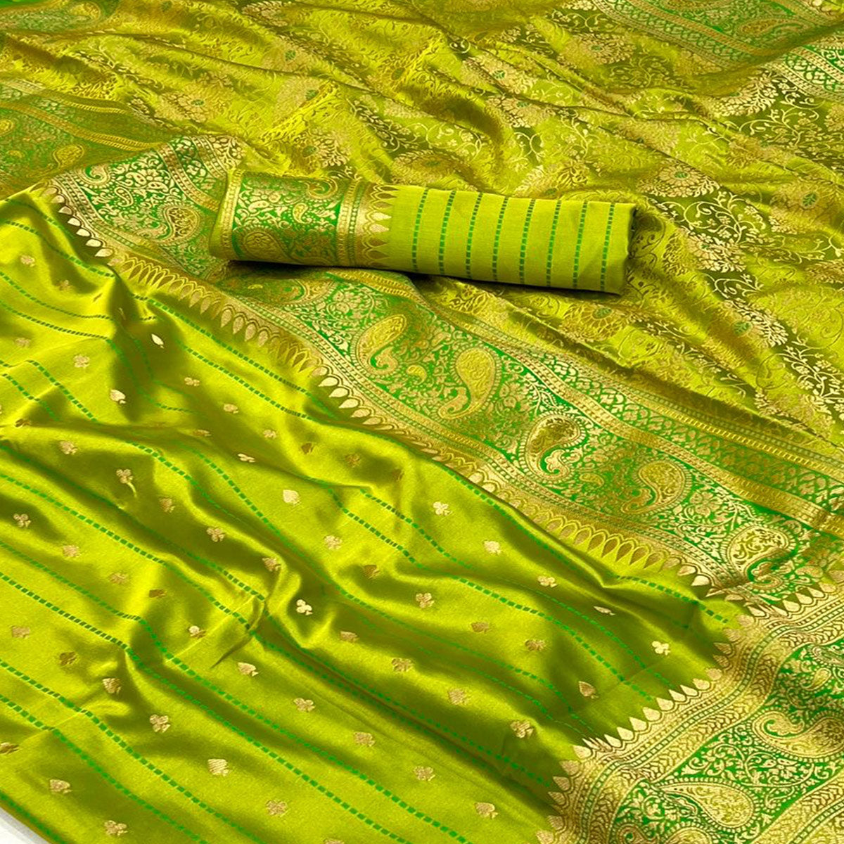Green Woven Zari Border Satin Saree With Tassels