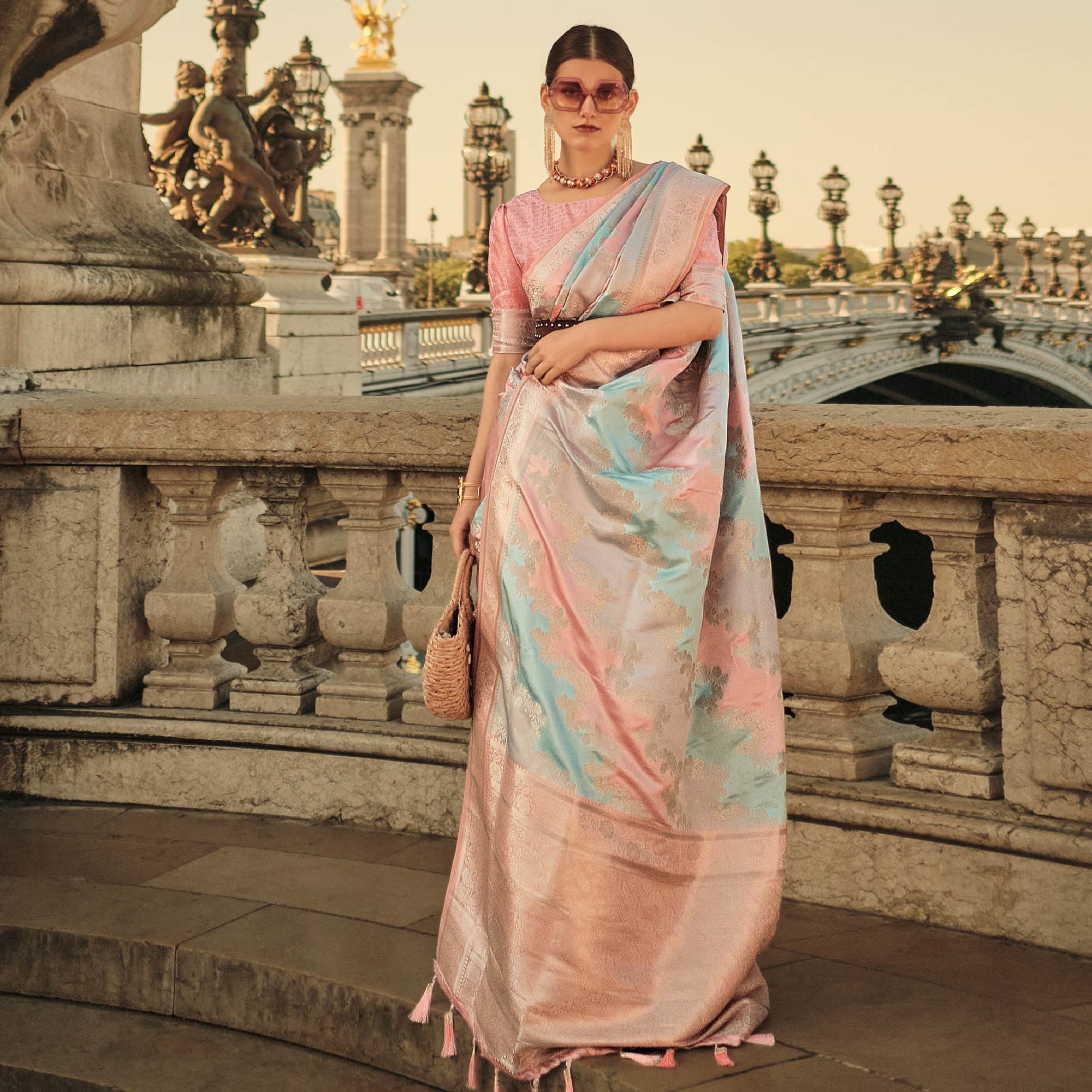 ⁠Peach Floral Woven Satin Saree With Tassels