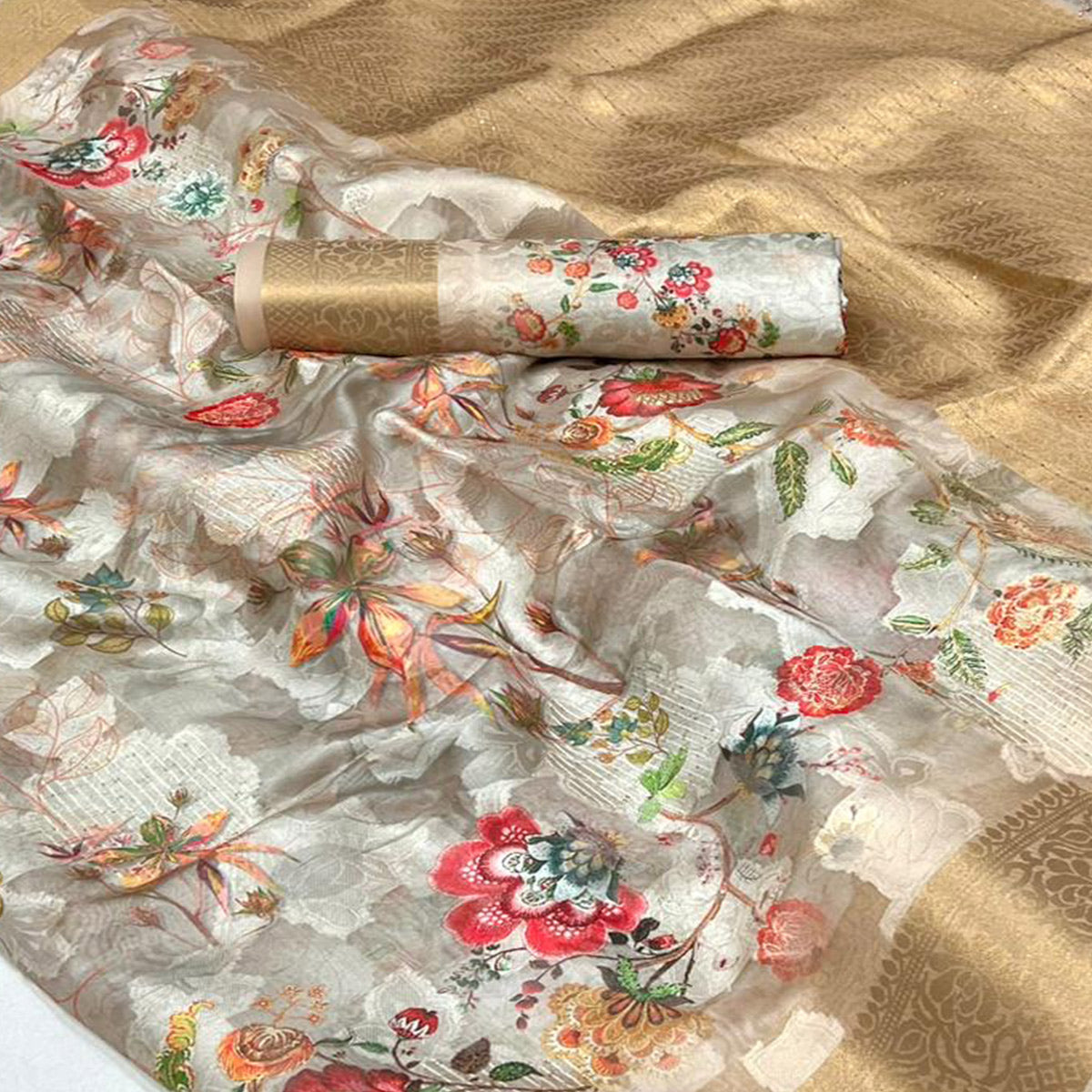 Beige Floral Woven Brasso Saree With Tassels