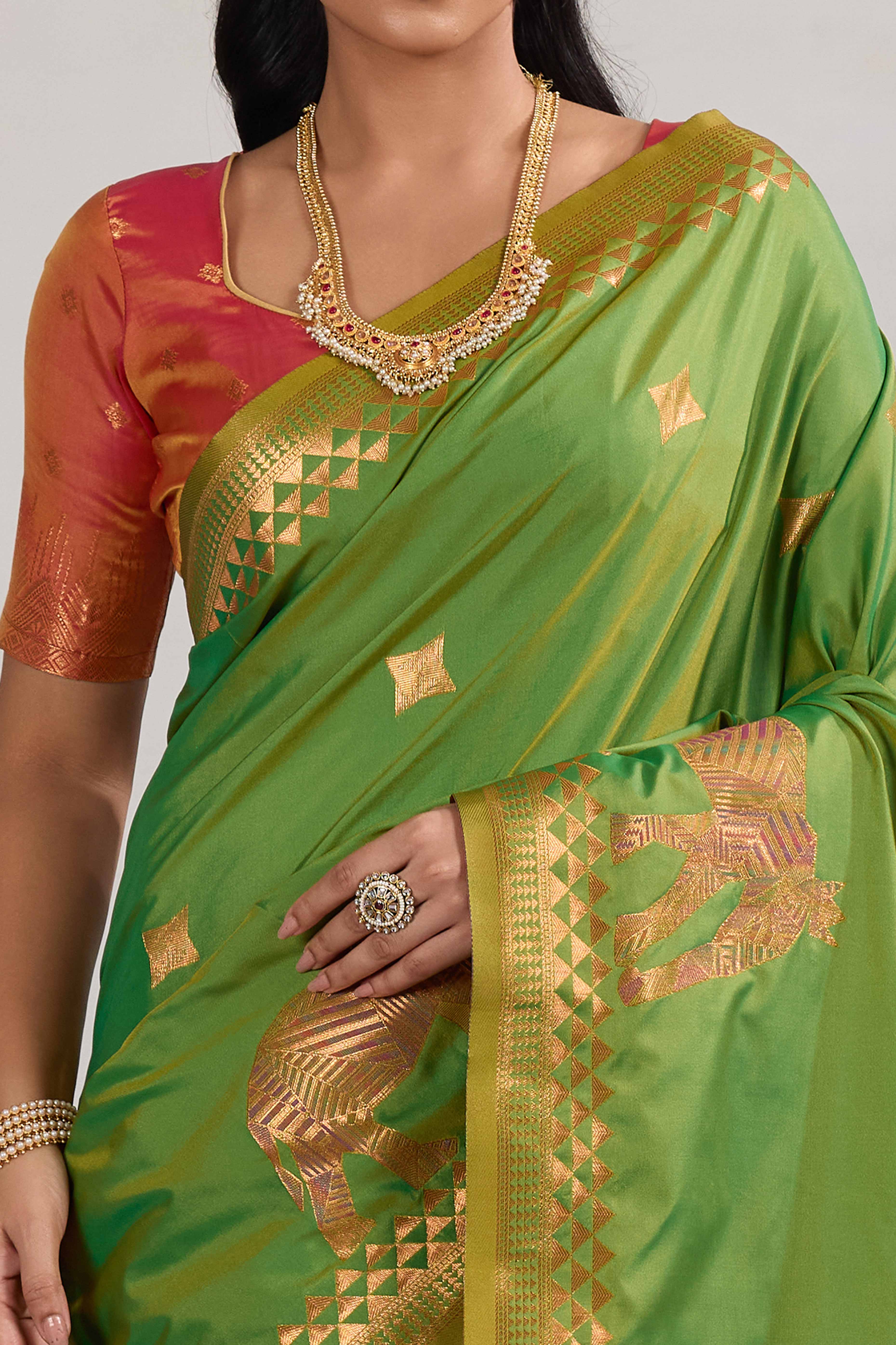 Traditional Parrot Green Pure Silk Saree Featuring Elephant Motif Zari Weaving & Tassel Pallu