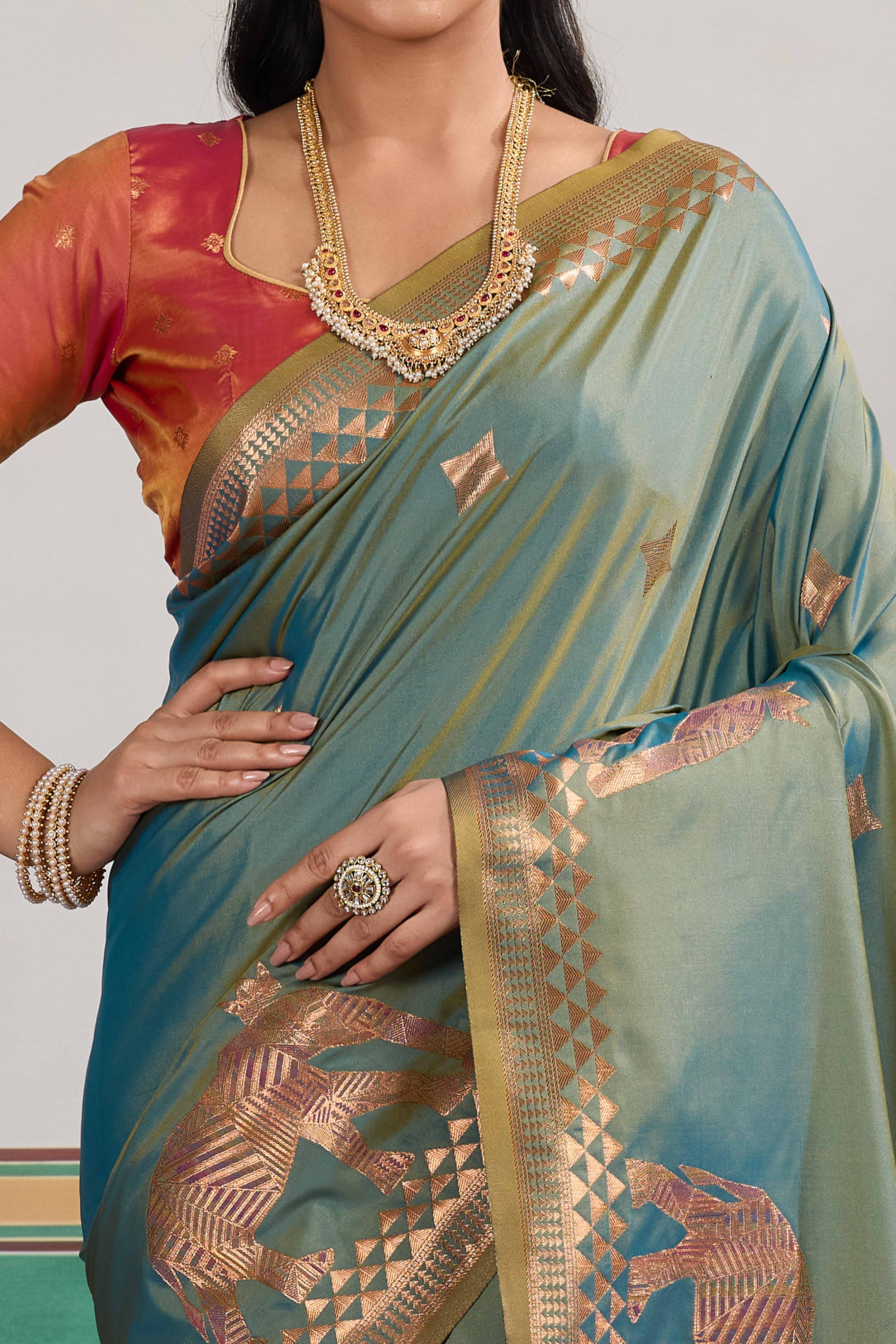 Traditional Teal Blue Pure Silk Saree Featuring Elephant Motif Zari Weaving & Tassel Pallu