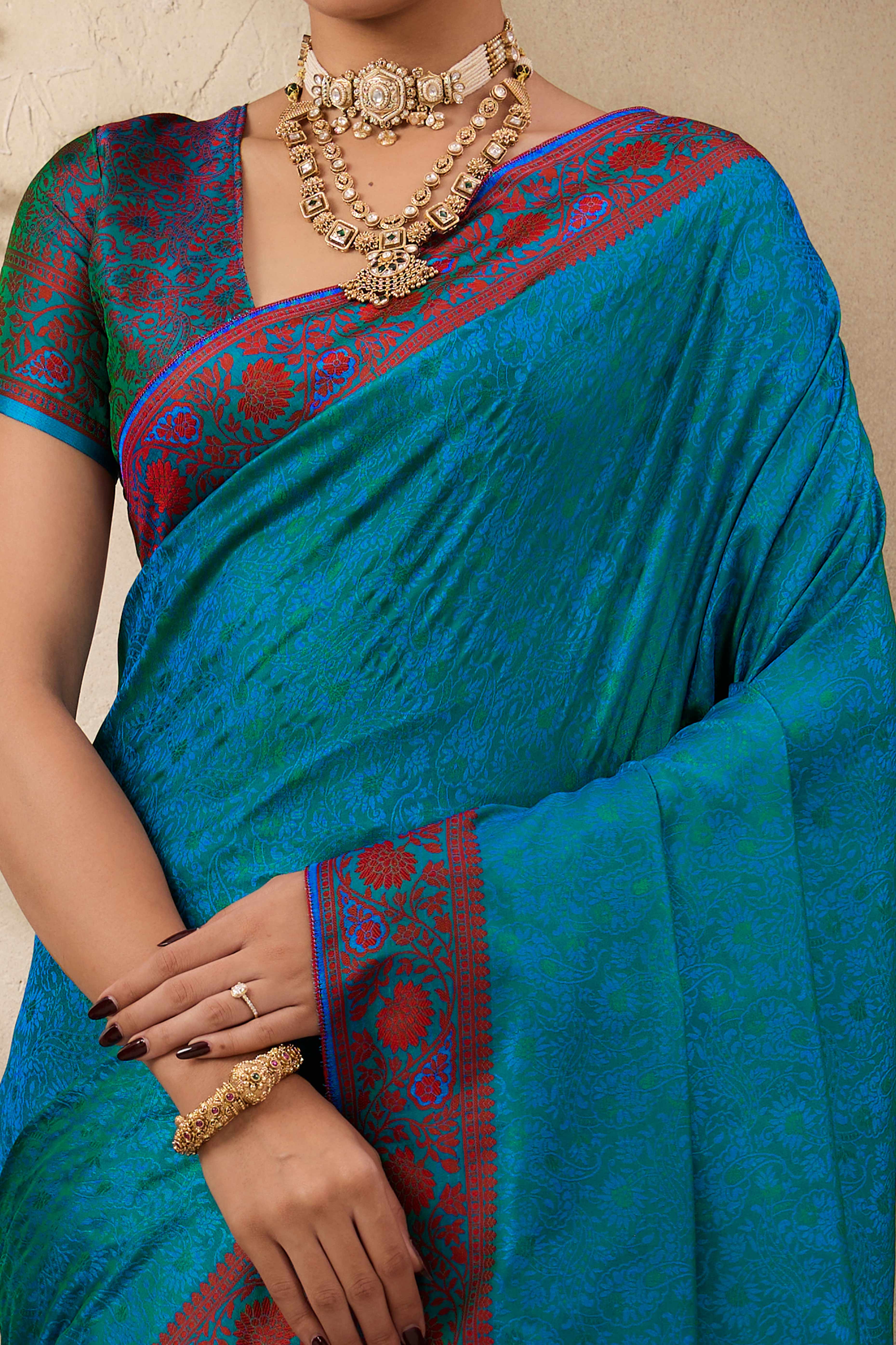 Teal Pure Silk Kanjivaram Handloom Saree Enhanced with Zari Woven Patterns