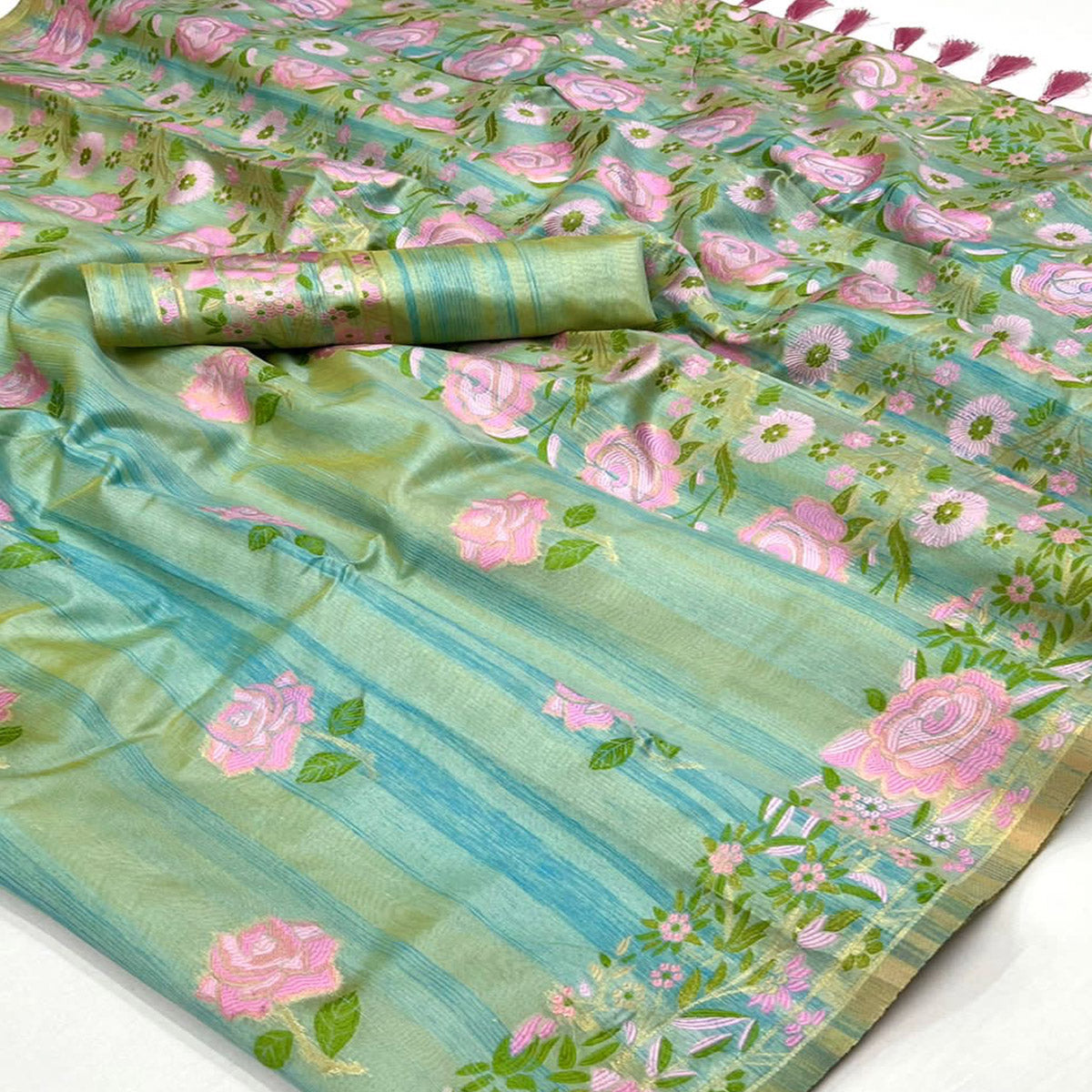 Pista Green Floral Woven Pure Silk Saree With Tassels