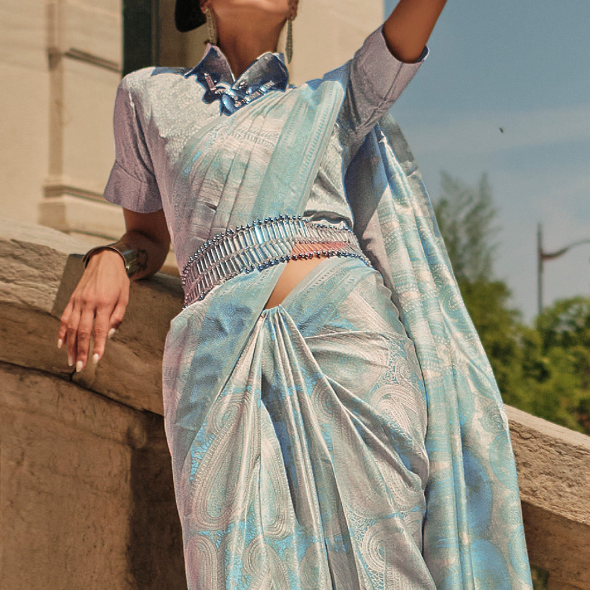 Blue Woven Satin Saree With Tassels