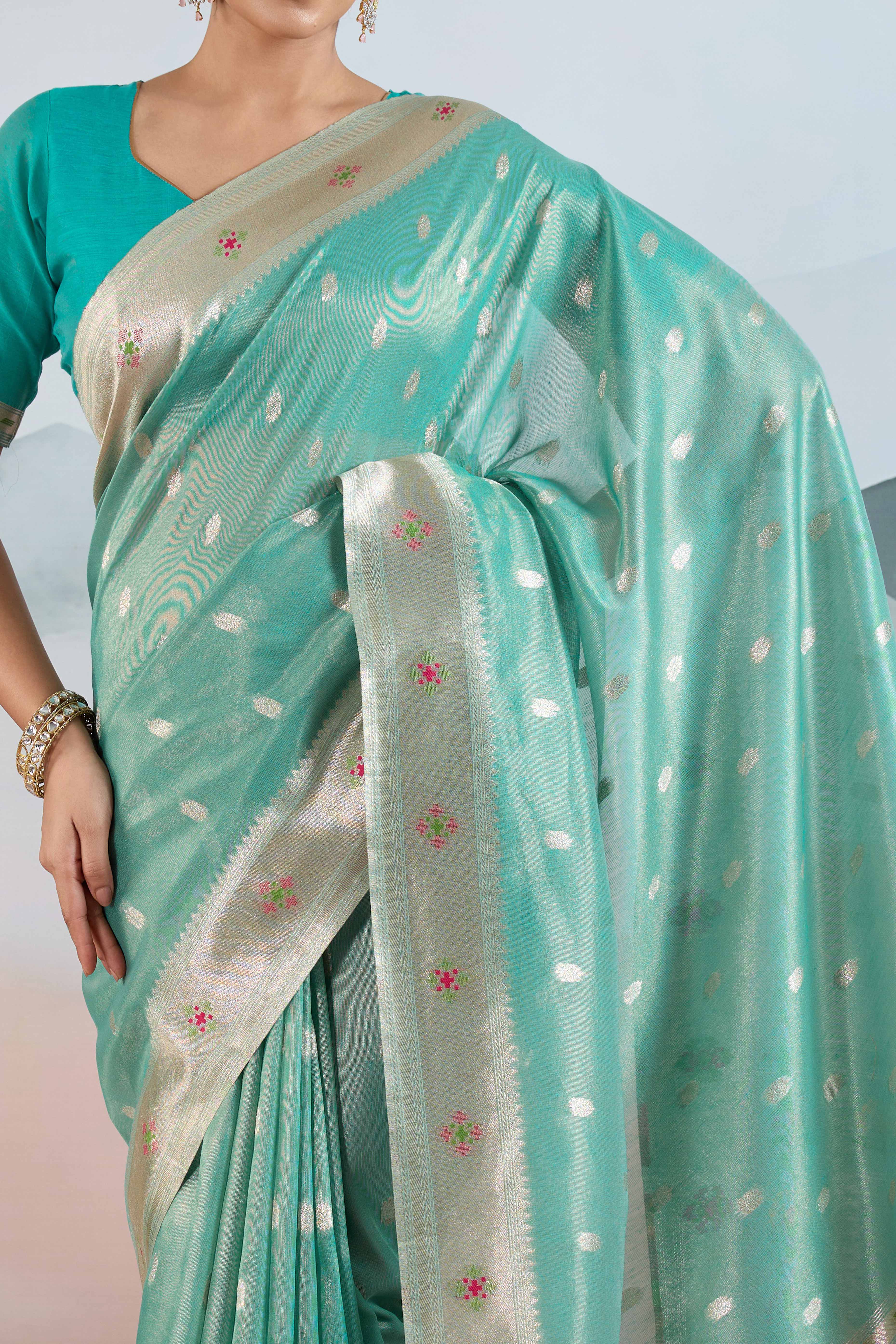 Turquoise Festive Tissue Saree Crafted with Artistic Zari Butti Weaving and a Featherlight Texture