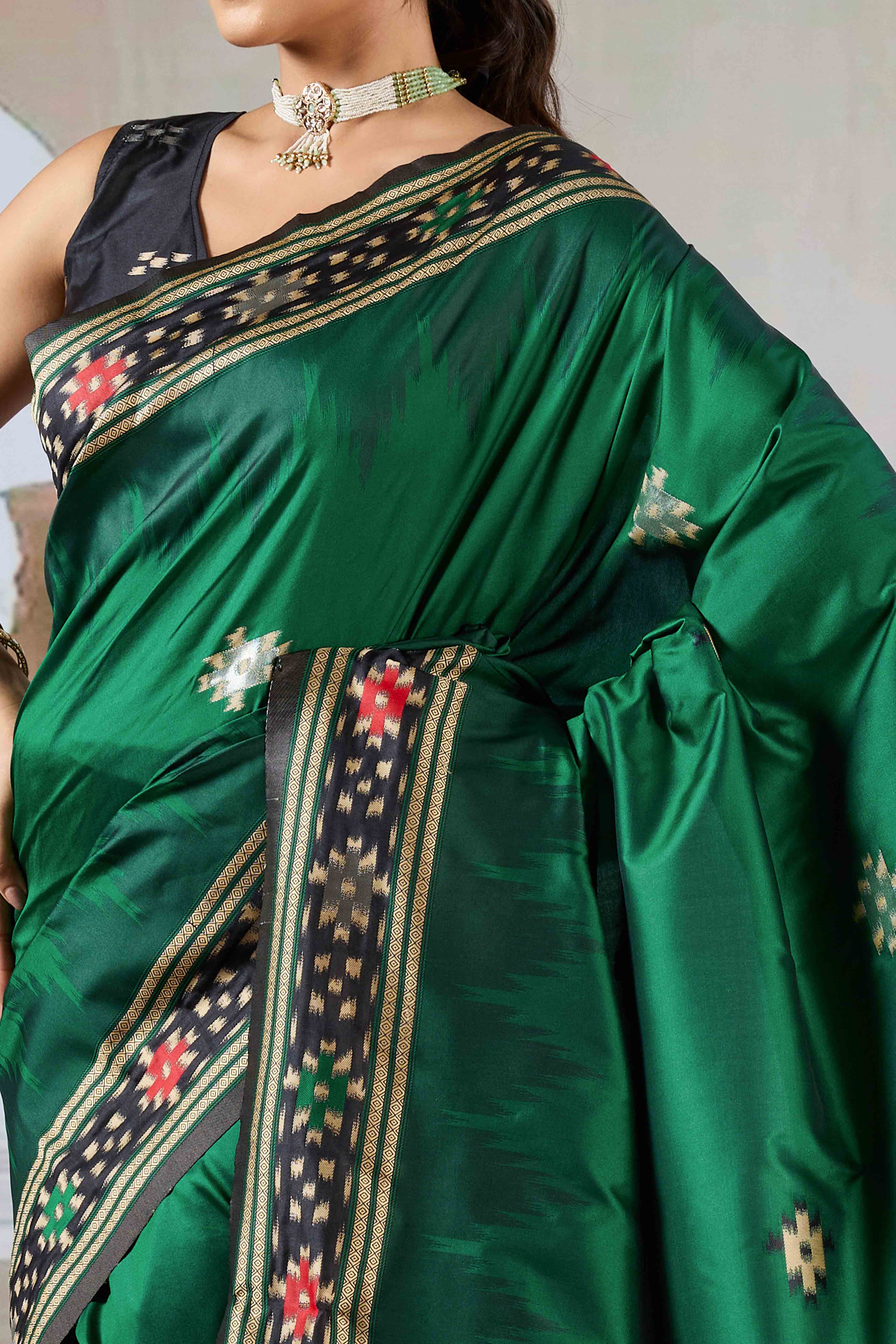 Green Art Silk Saree Adorned with Intricate Patola Style Woven Designs