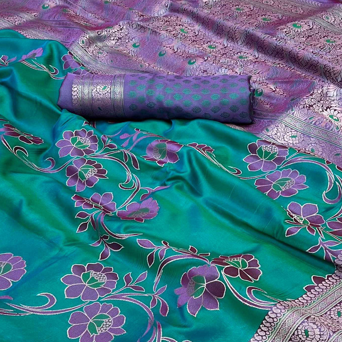 Rama Blue Floral Woven Satin Saree With Tassels