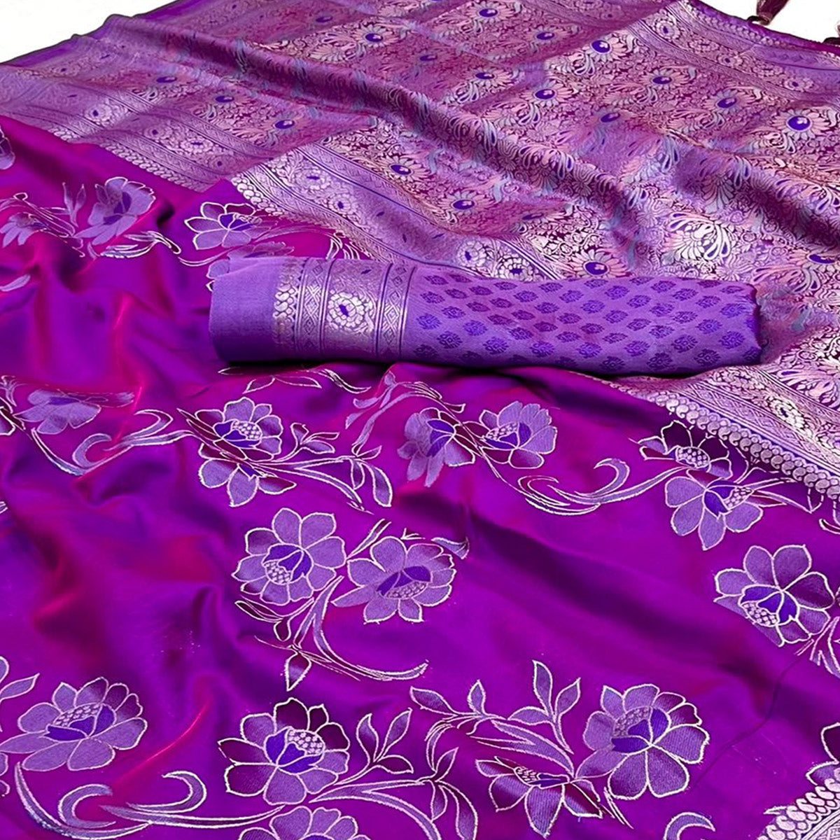 Purple Floral Woven Satin Saree With Tassels