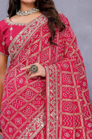 Pink Vichitra Silk Saree Highlighted with Bandhani Print and Sequins Embroidered Border