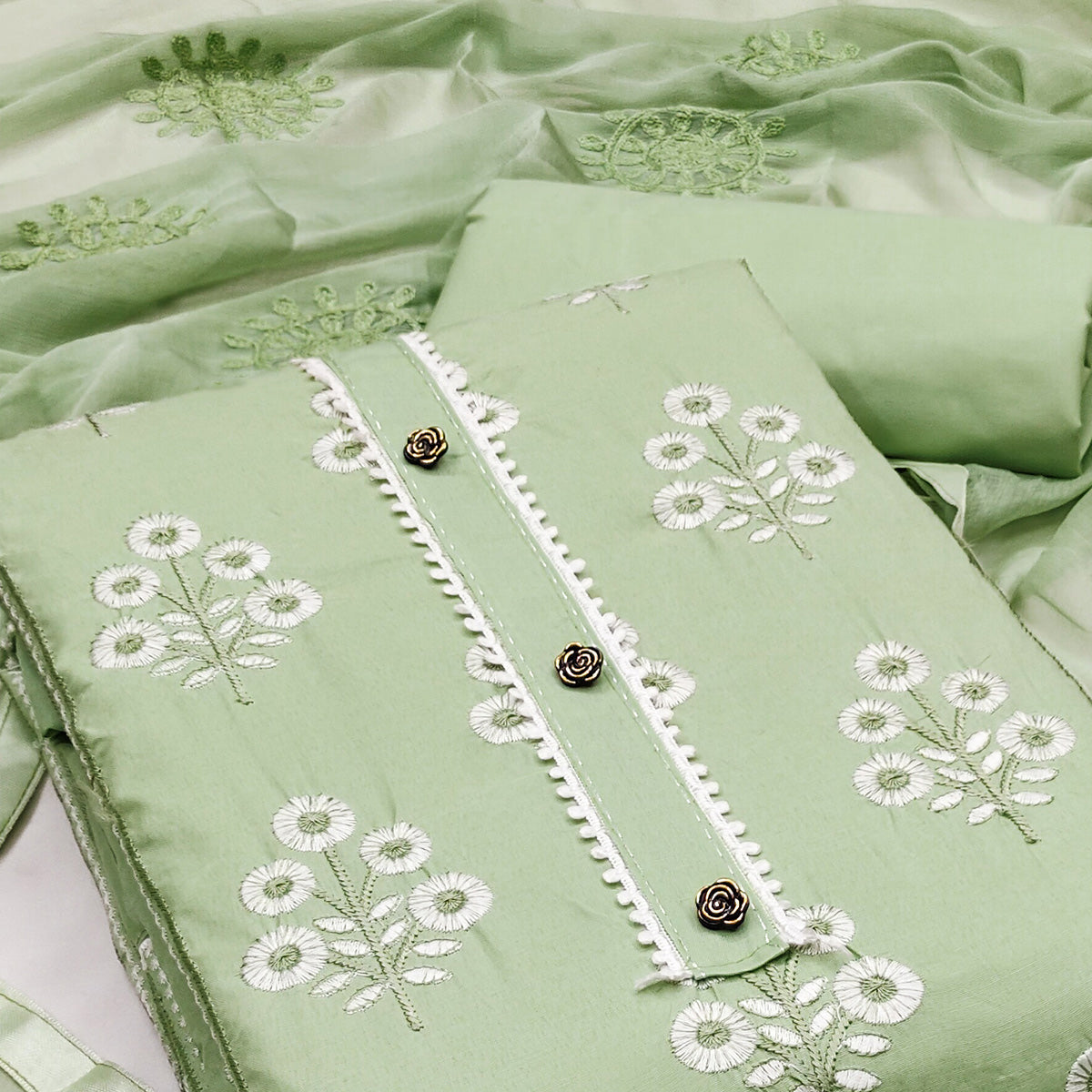 Make a Statement with Pista Green Floral Thread Embroidered Cotton Blend Dress Material