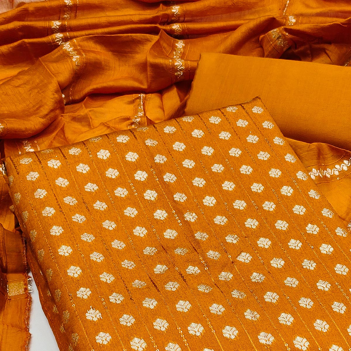 Redefine Elegance with this Mustard Floral Woven With Sequins Embroidered Banarasi Jacquard Dress Material