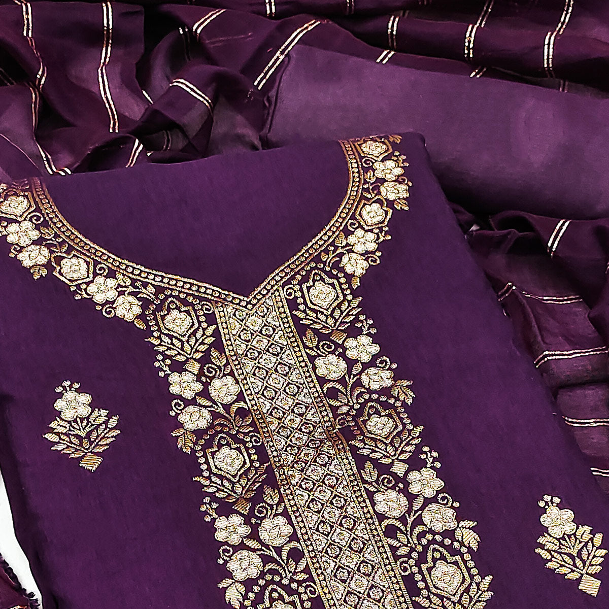 Elegant Royal Wine Banarasi Jacquard Dress Material Adorned With Ornate Zari Floral Weaves