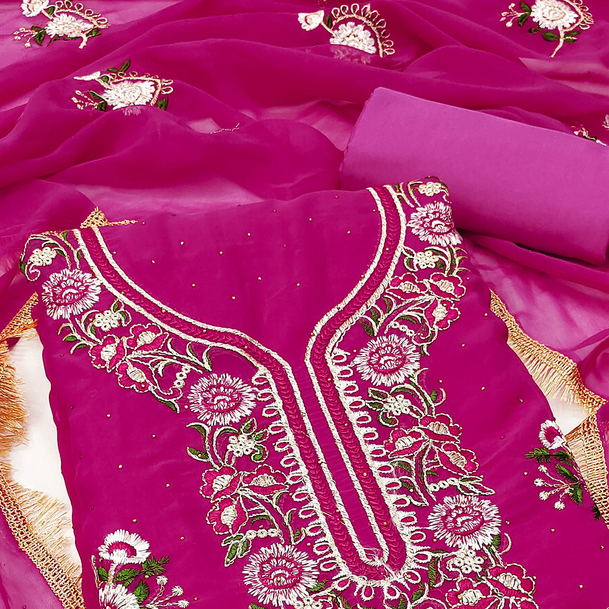 Rani Pink Georgette Dress Material With Exquisite Floral Embroidery & Shimmering Stonework
