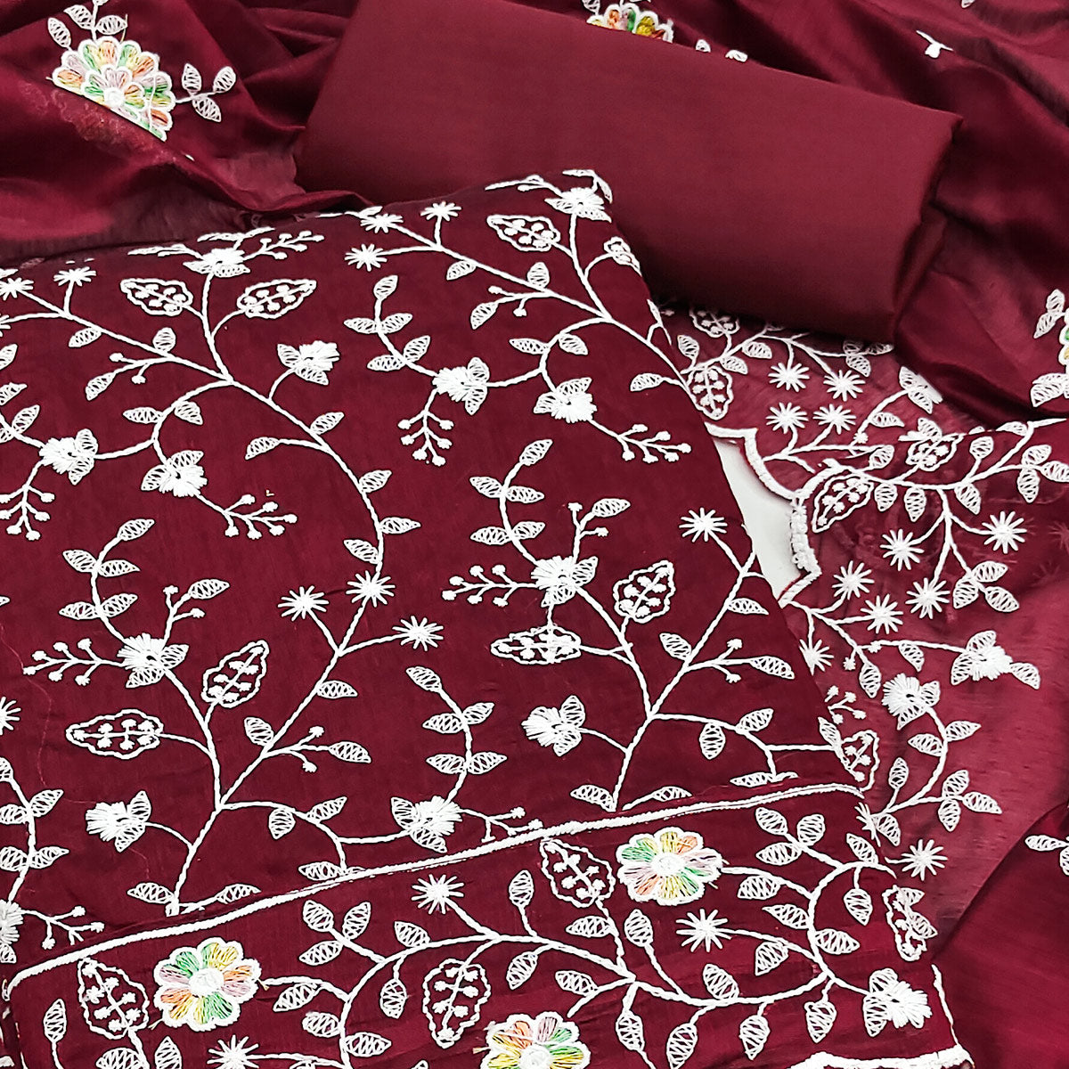 Sophisticated Maroon Chanderi Silk Dress Material With Exquisite Floral Thread Embroidery