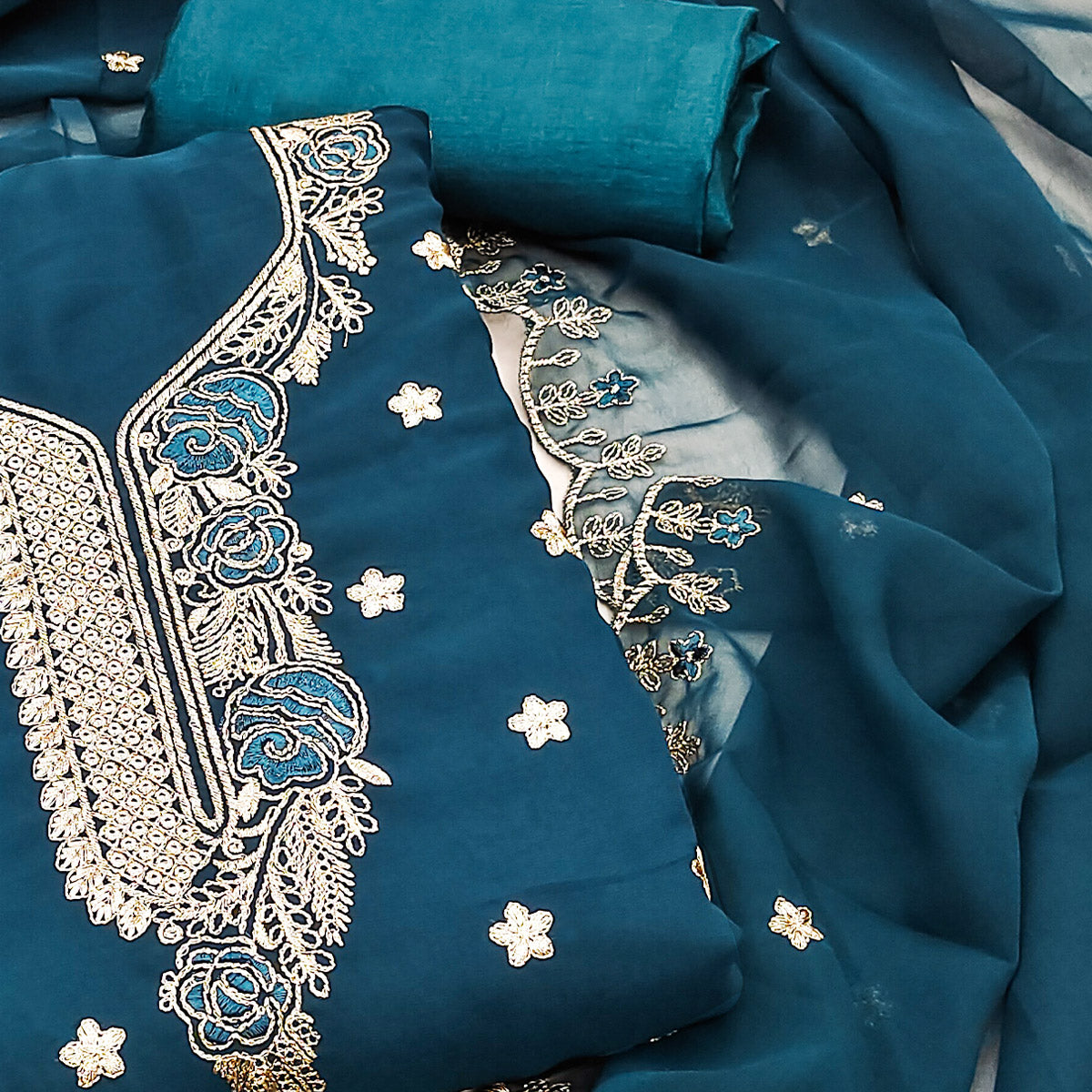 Blue Dress Material Featuring Delicate Floral Thread & Zari Embroidery Work On Georgette