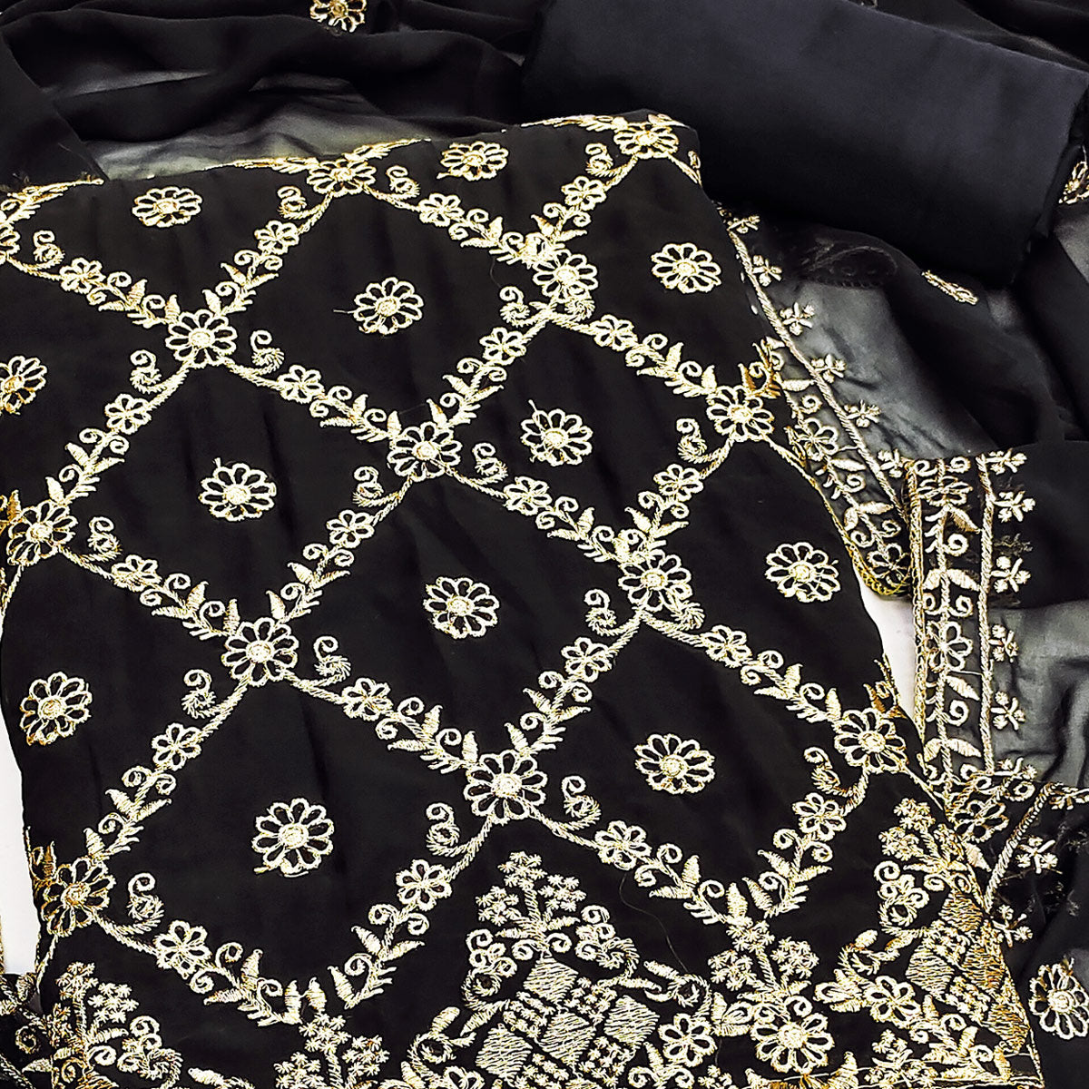 Black Georgette Dress Material Adorned With Floral Zari Embroidery Work