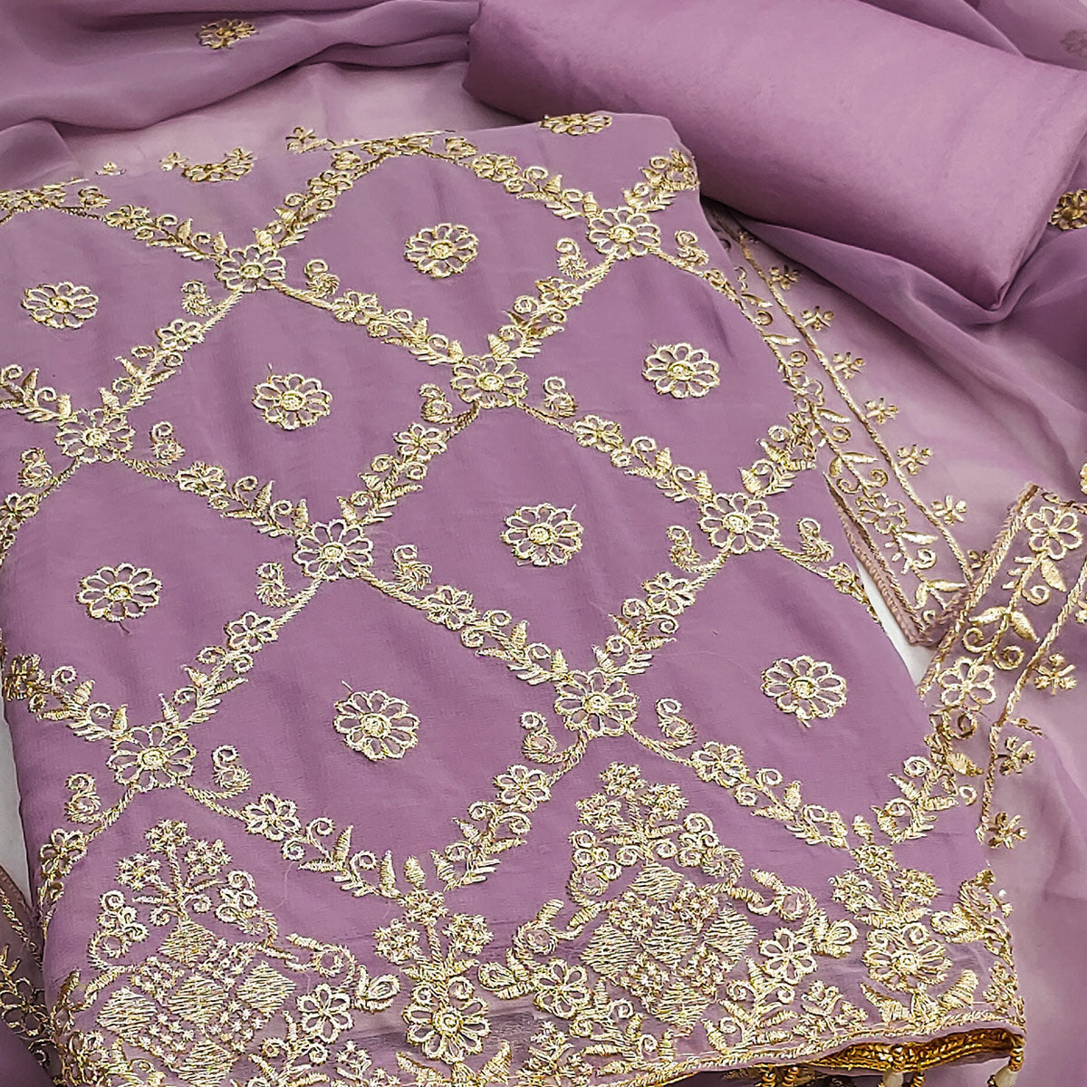 Orchid Purple Georgette Dress Material Adorned With Floral Zari Embroidery Work