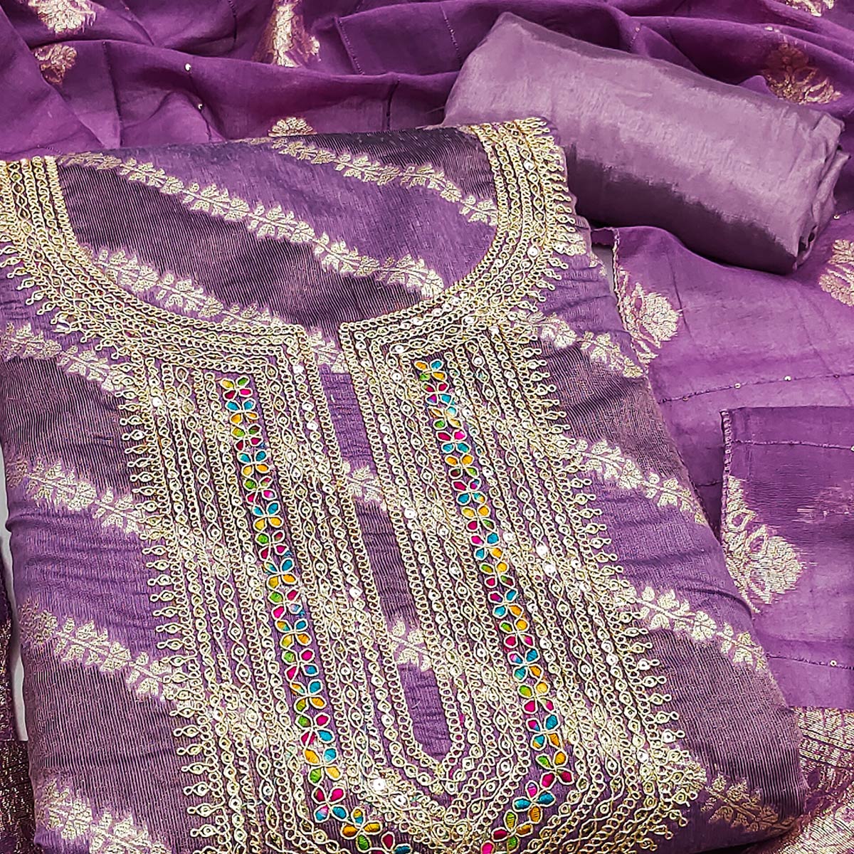 Rich Purple Banarasi Silk Dress Material Featuring Floral Weaving & Neck Cording Embroidery