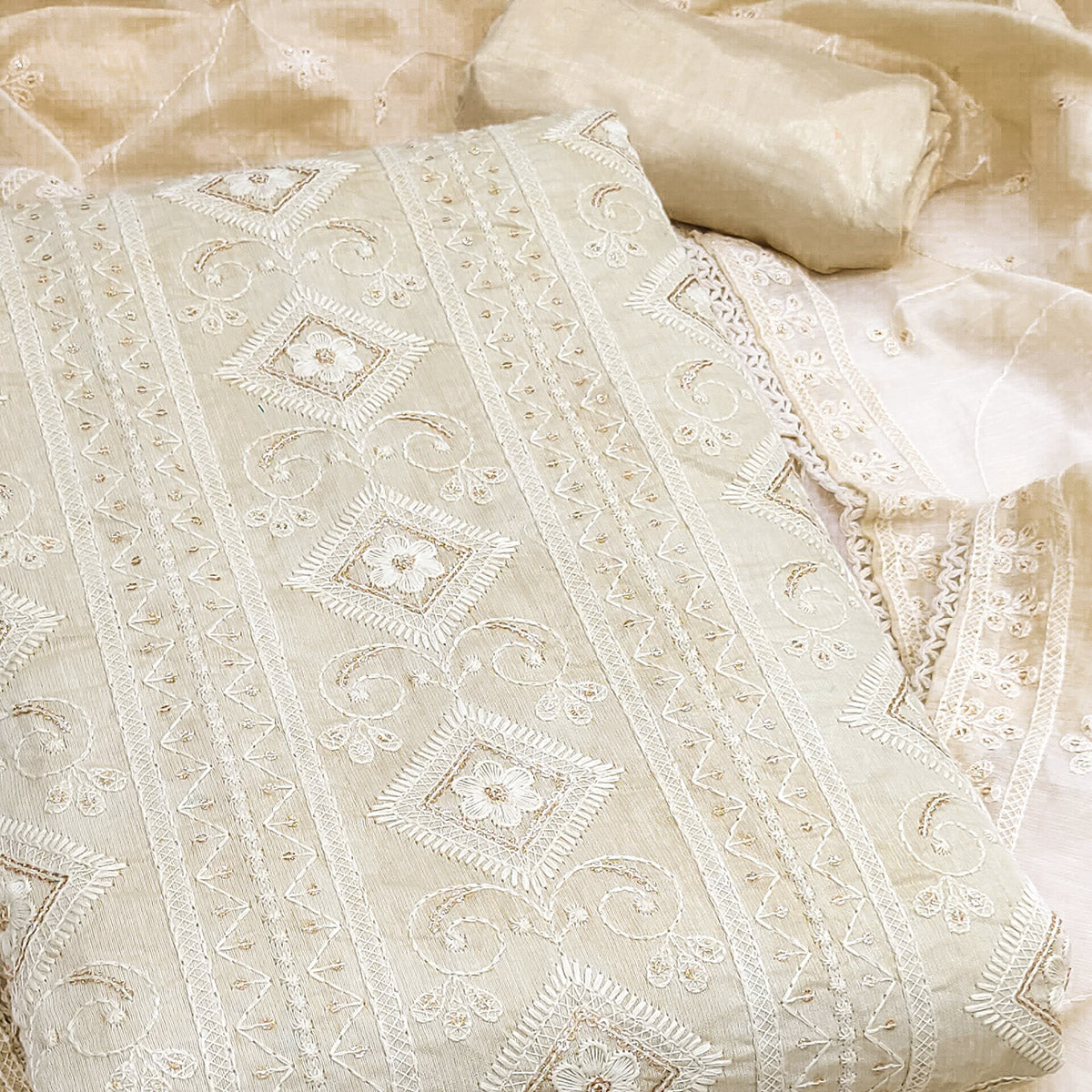 Cream Lucknowi Embroidery Work Dress Material Crafted In Premium Modal Chanderi Silk