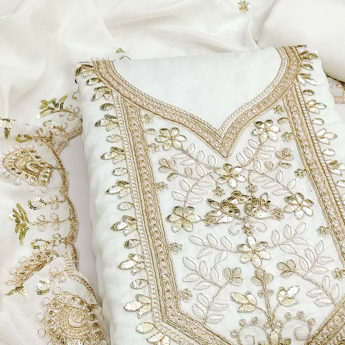 Timeless Offwhite Floral Embroidered Vichitra Silk Dress Material Highlighted With Gota Patti Work
