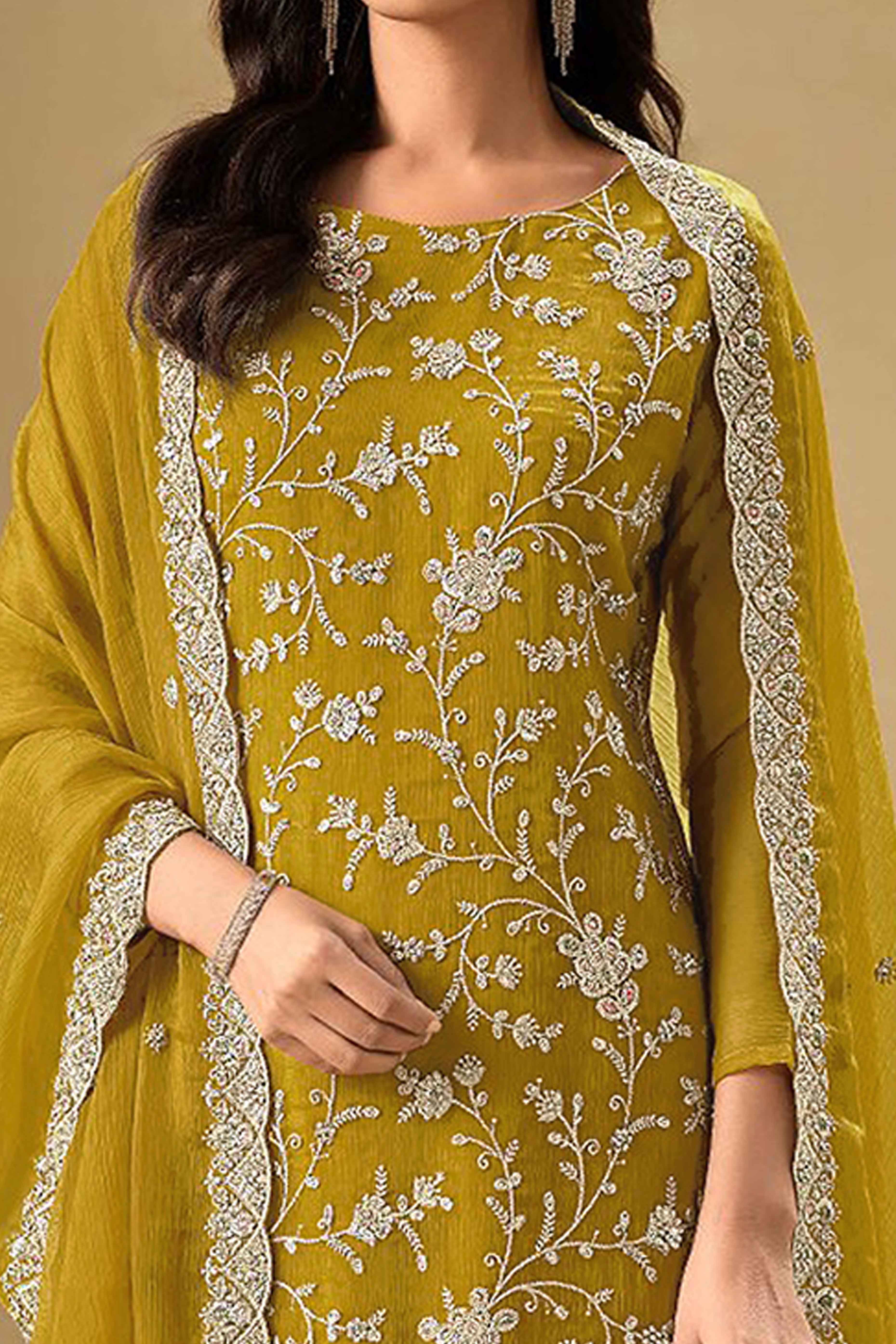 Embroidered Mustard Semi Stitched Suit With A Touch of Sequin & Studded Zarkan Work