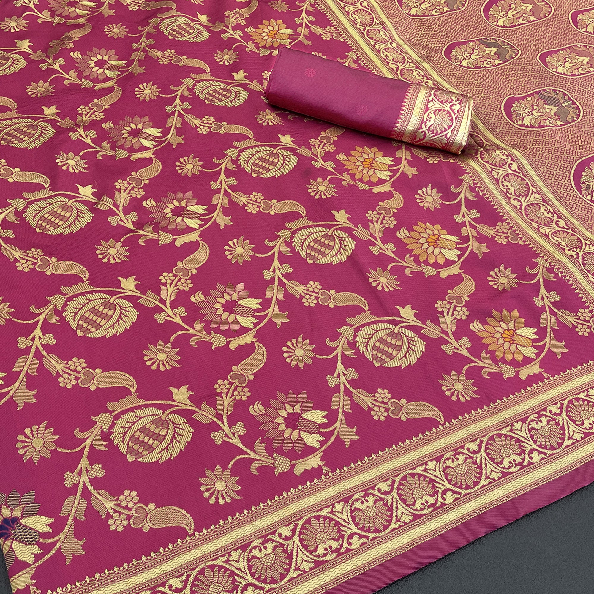 Charming Rani Pink Banarasi Silk Saree Adorned With Floral Zari Weaving