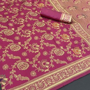 Charming Rani Pink Banarasi Silk Saree Adorned With Floral Zari Weaving