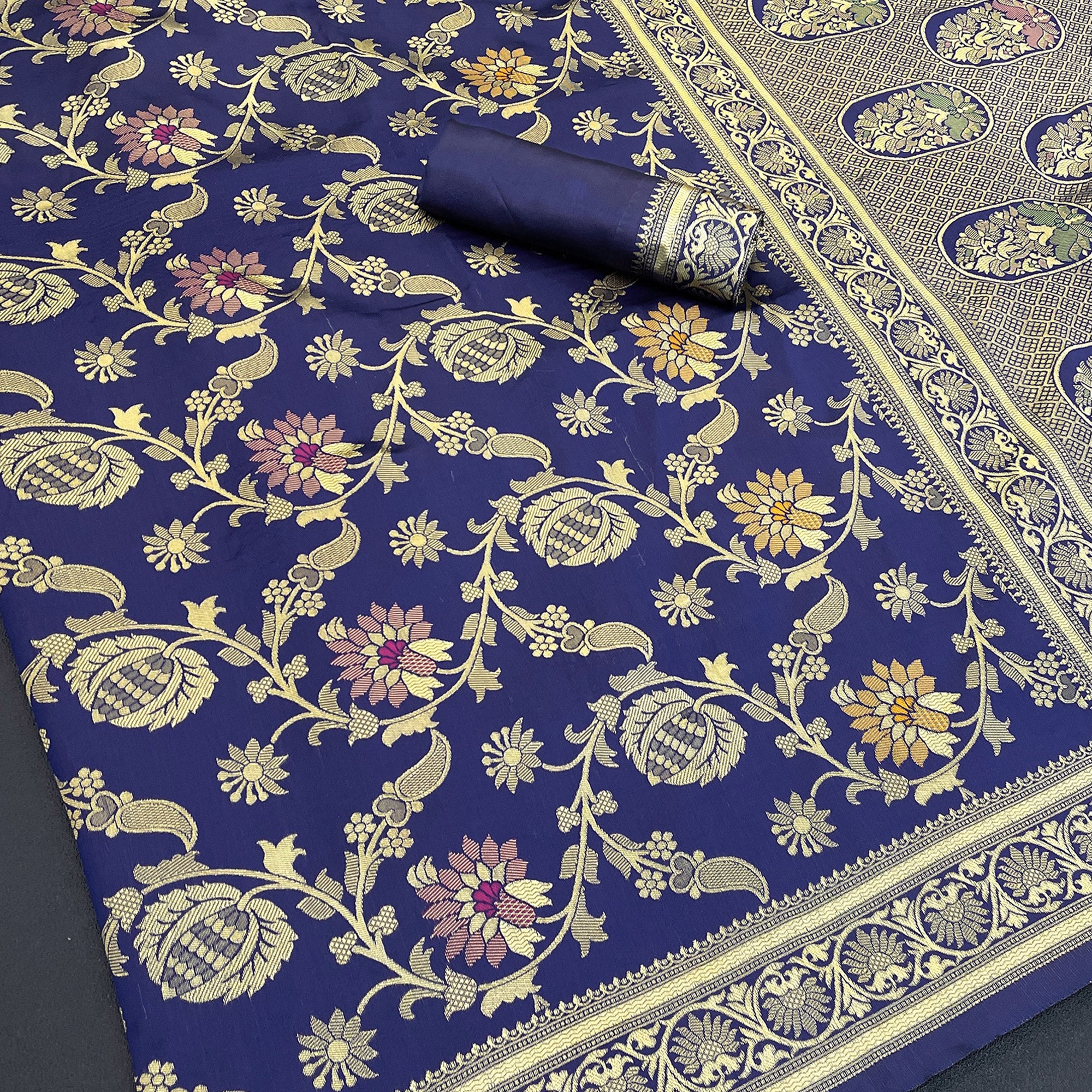 Charming Navy Blue Banarasi Silk Saree Adorned With Floral Zari Weaving