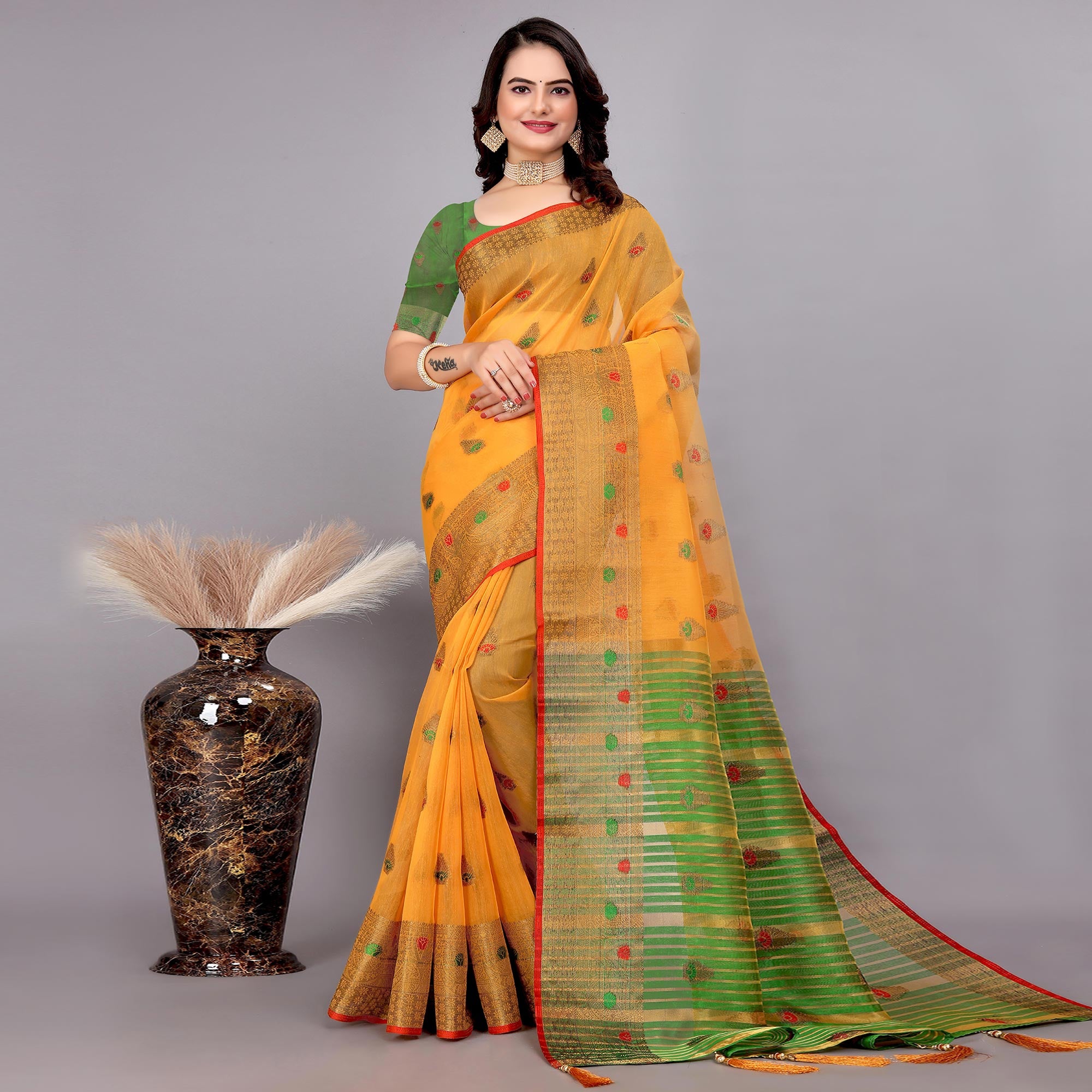 Yellow Floral Woven Cotton Silk Saree With Tassels