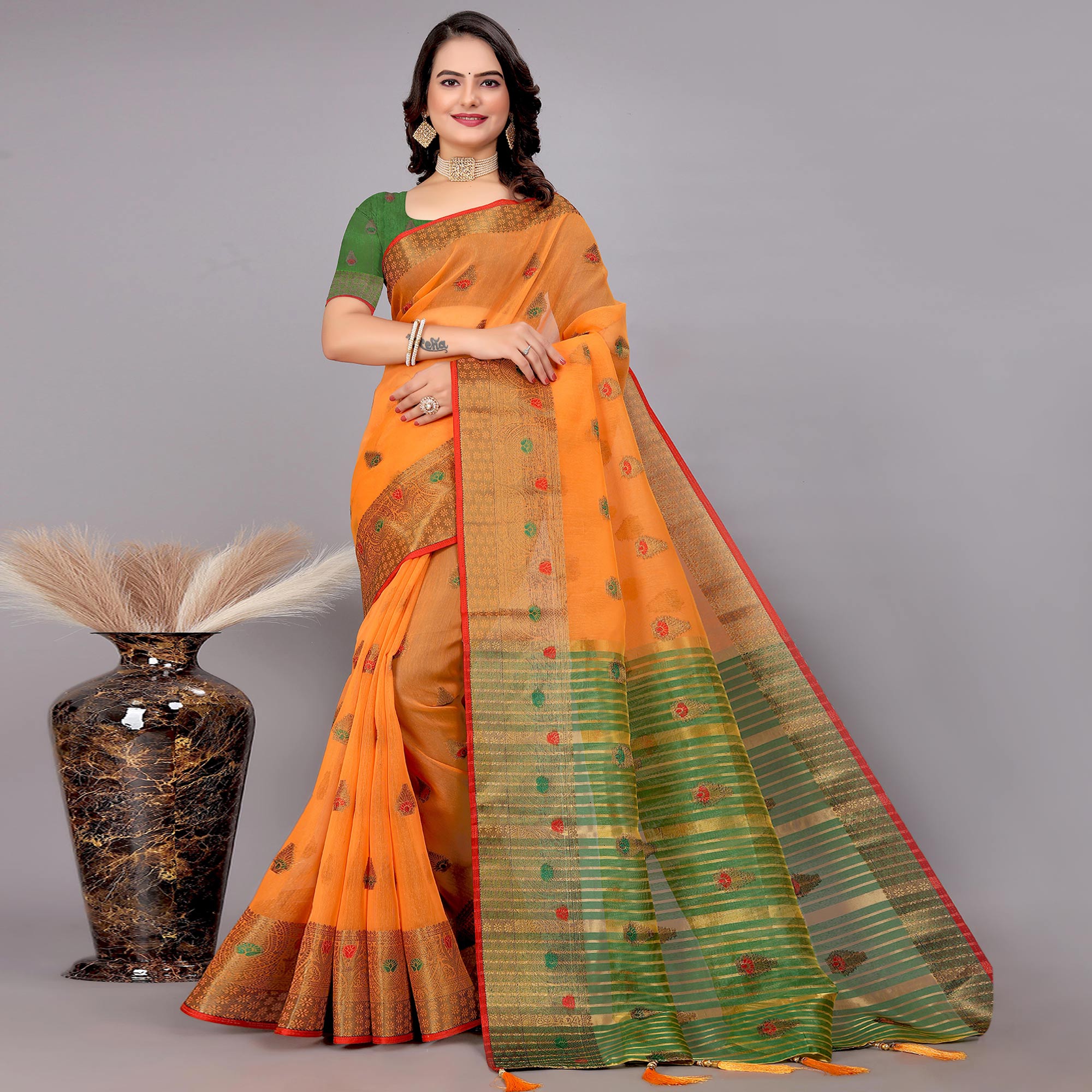 Orange Floral Woven Cotton Silk Saree With Tassels