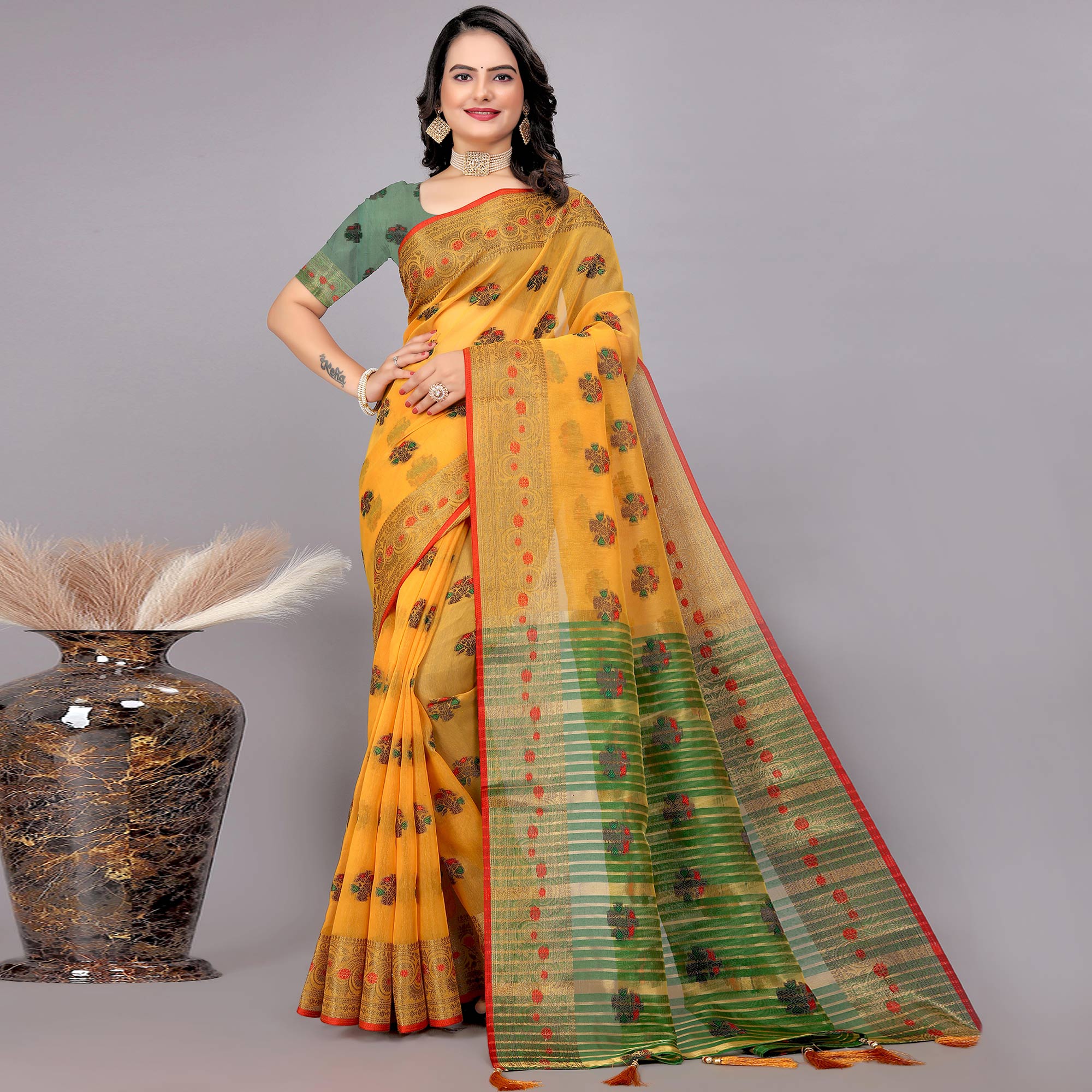 Yellow Floral Woven Cotton Silk Saree With Tassels