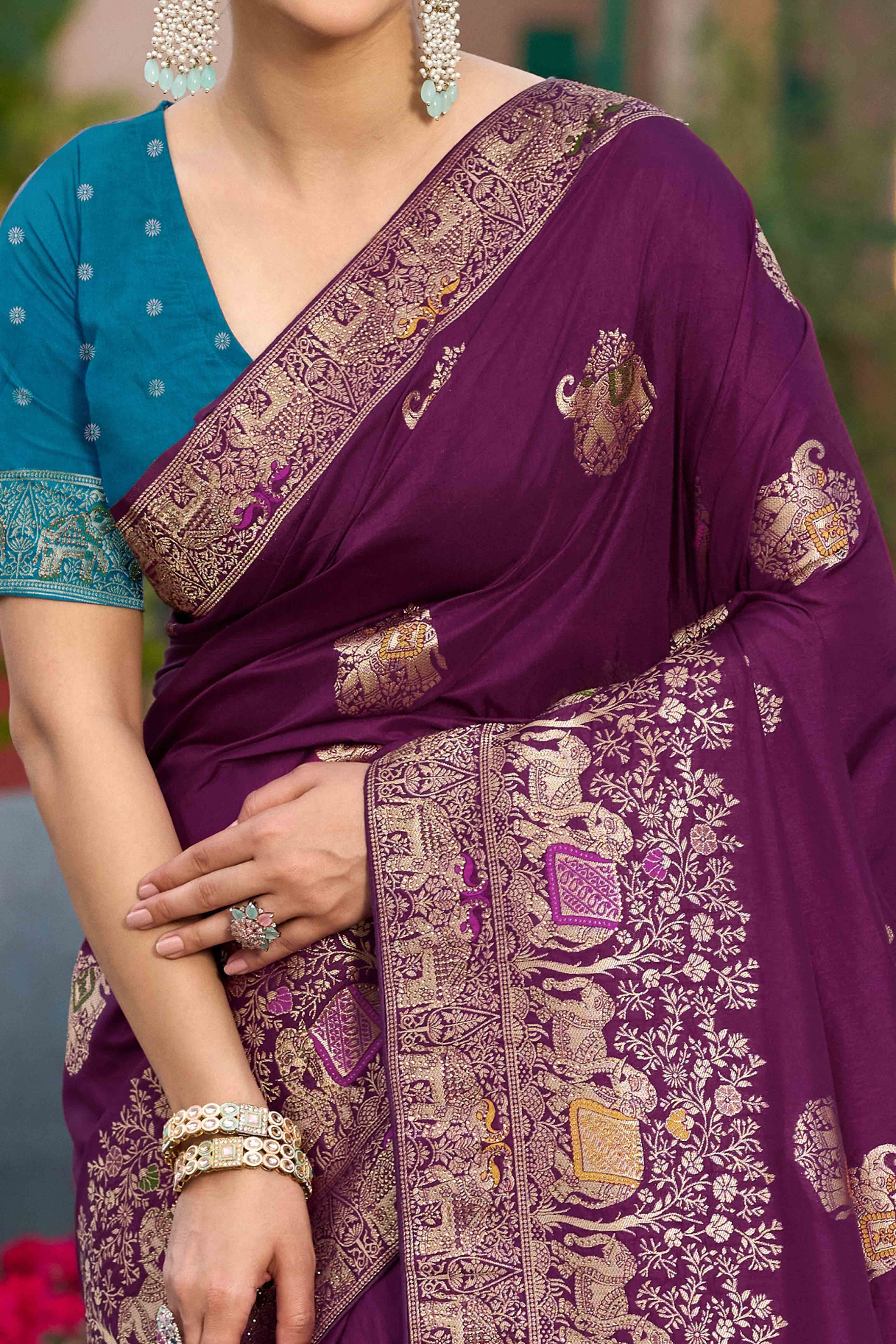 Wine Zari Woven Dola Silk Saree With Intricate Meenakari & Swarovski Embellishments
