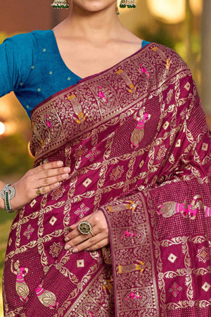 Burgundy Dola Silk Saree Featuring Intricate Gharchola Woven Design
