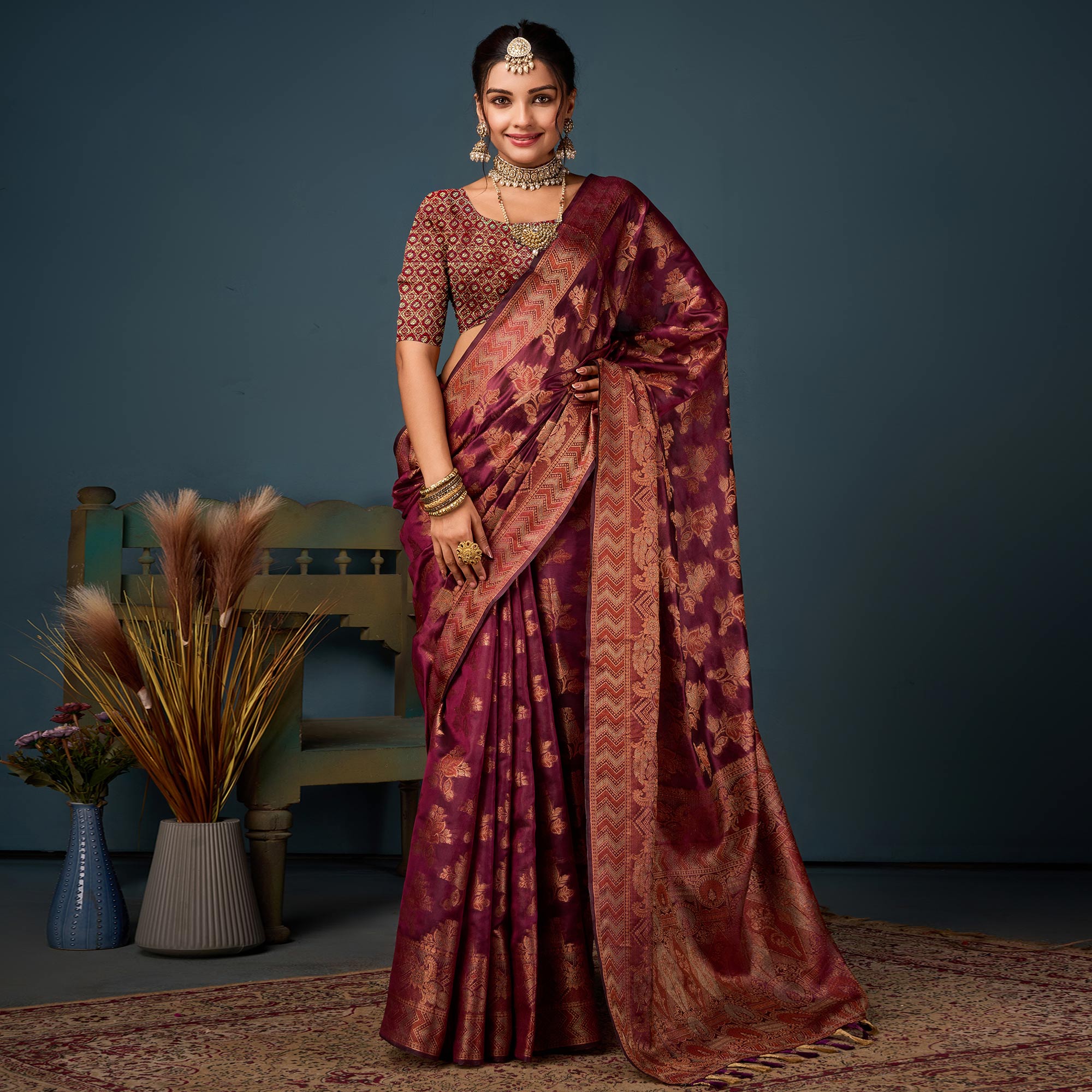 Wine Floral Woven Organza Saree With Tassels