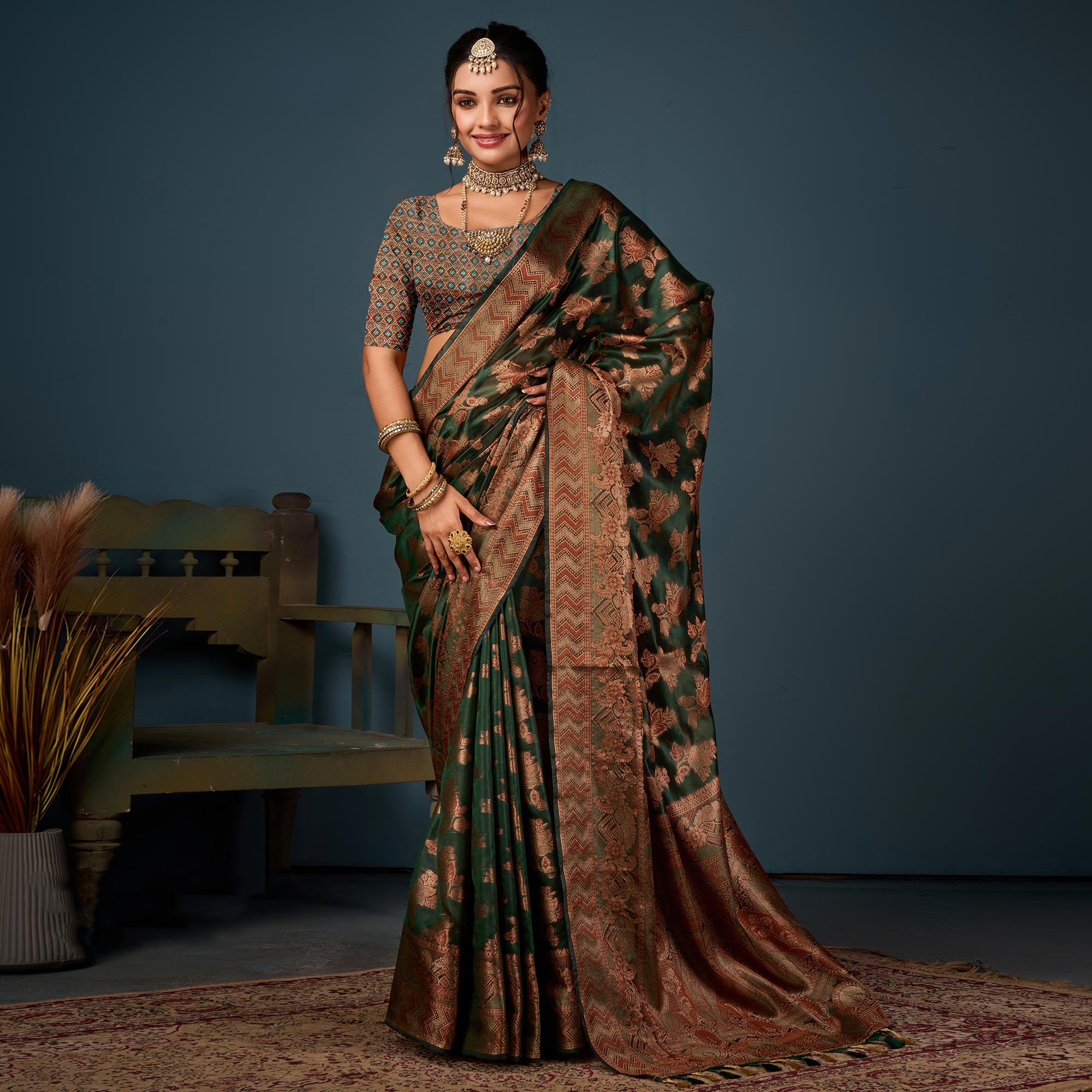 Bottle Green Floral Woven Organza Saree With Tassels