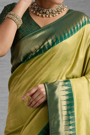 Green Silk Kanjivaram Saree Enhanced With Kadiyal Weaving Borders