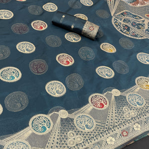 Charming Morpich Blue Zari Woven Floral Organza Saree Accented With Digital Printed Pallu & Latkan