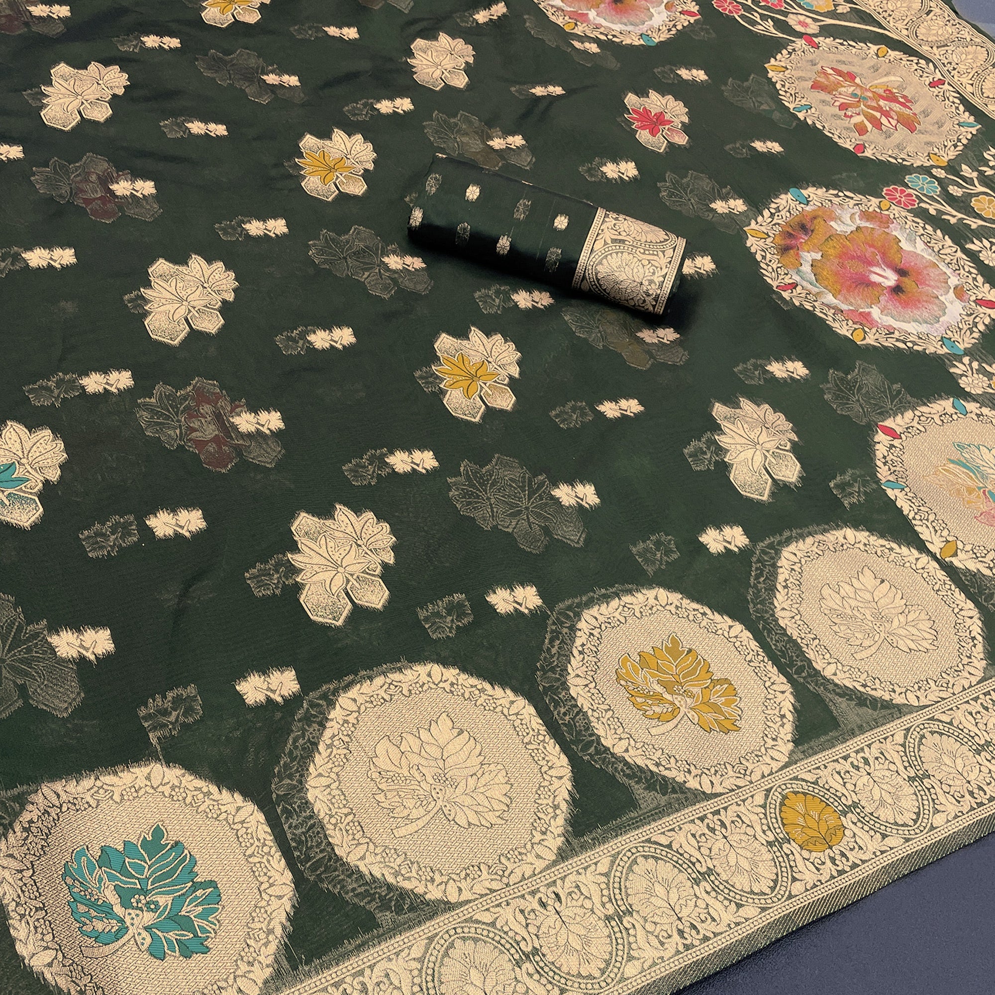 Charming Dark Green Zari Woven Floral Organza Saree Accented With Digital Printed Pallu & Latkan