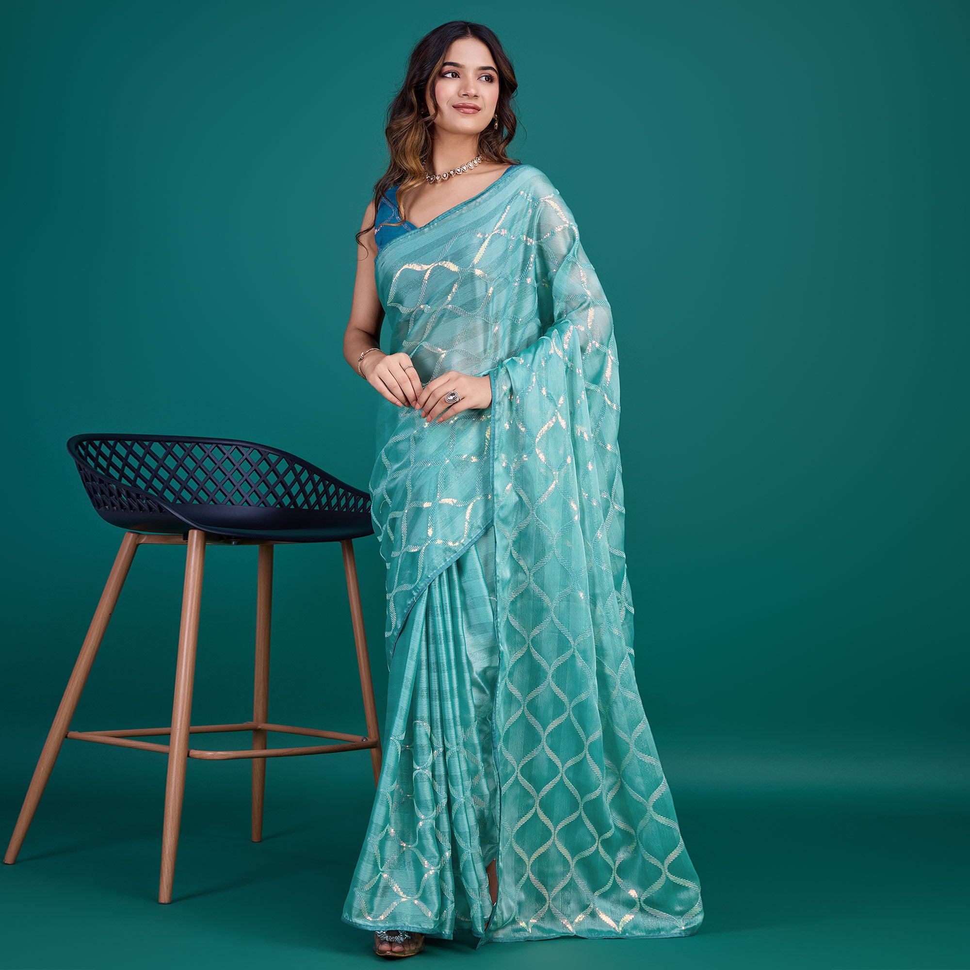 Turquoise Sequins Embroidered Georgette Saree